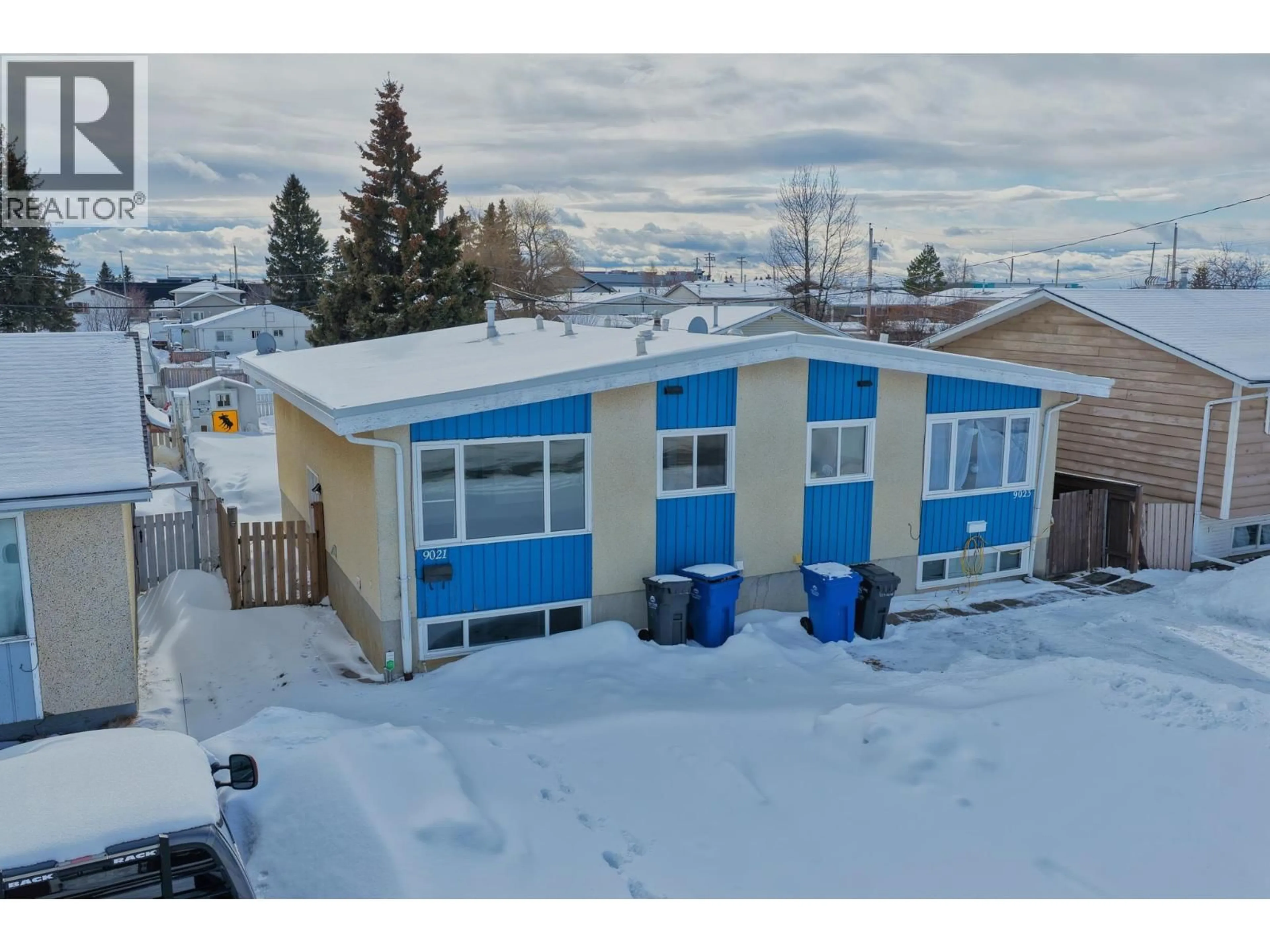 A pic from outside/outdoor area/front of a property/back of a property/a pic from drone, street for 9021 102 AVENUE, Fort St. John British Columbia V1J2G4