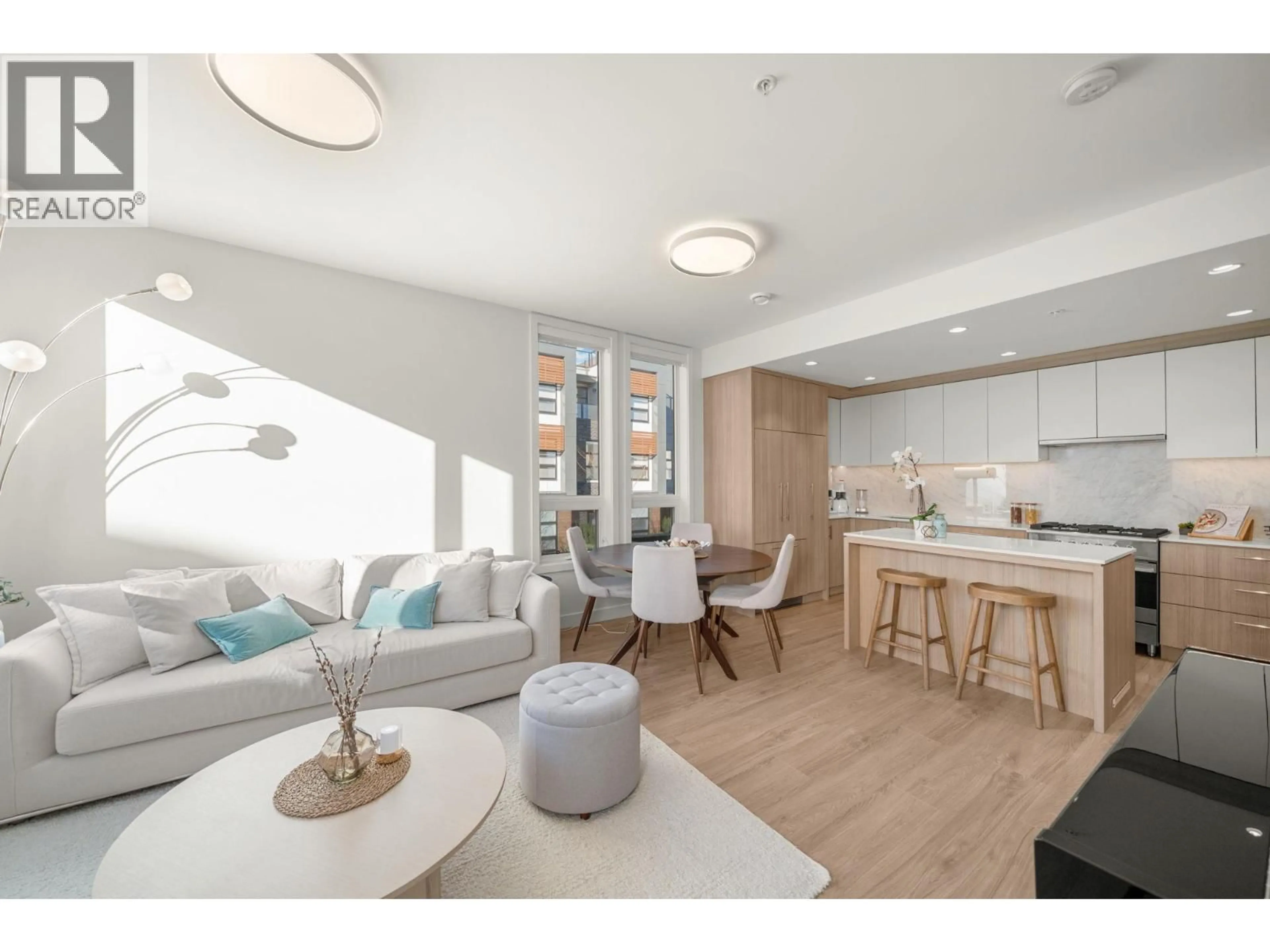 Open concept kitchen, wood/laminate floor for 312 - 6085 IRMIN STREET, Burnaby British Columbia V5J0J7