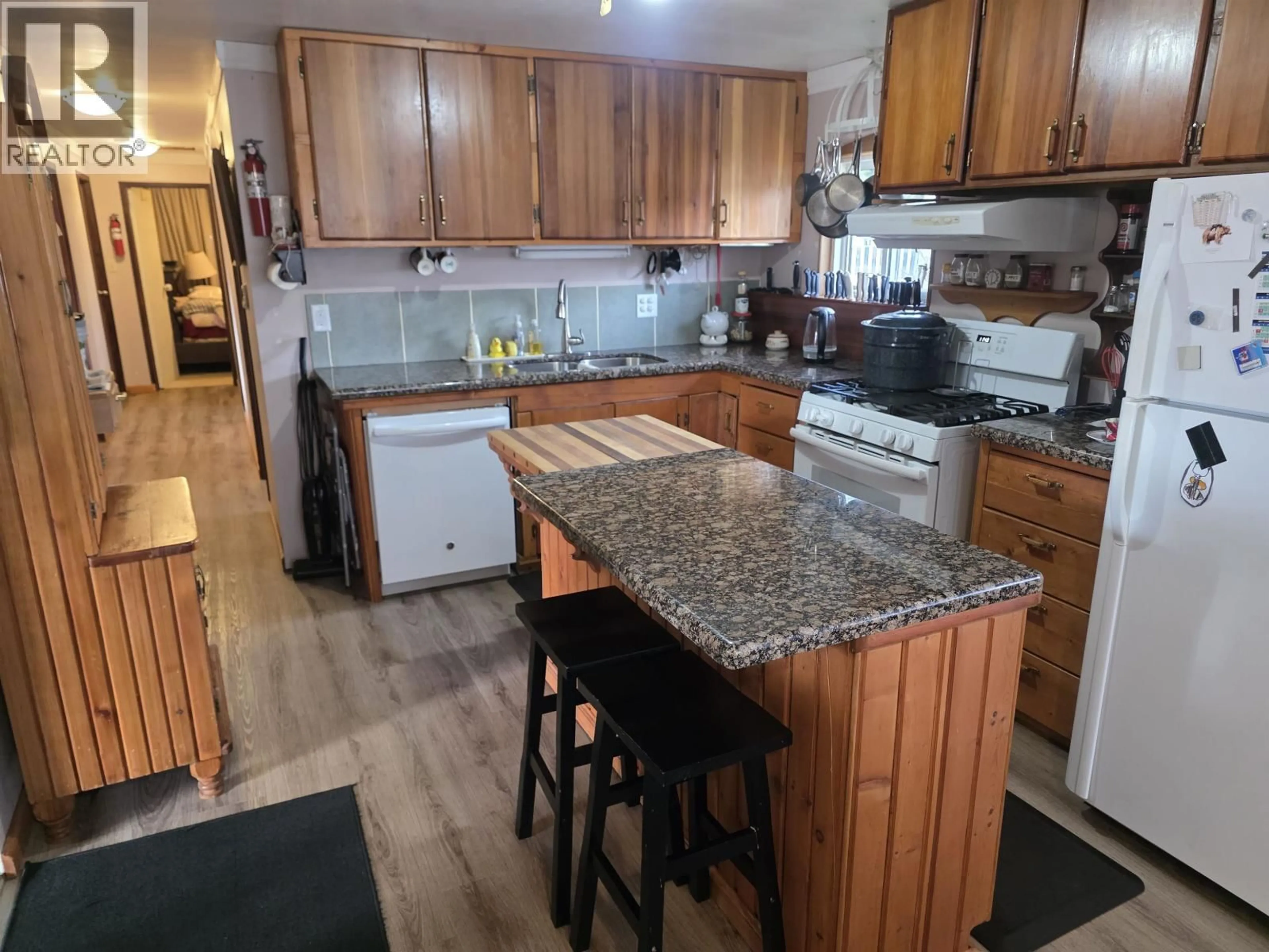 Open concept kitchen, wood/laminate floor for 3987 WALKER STREET, Terrace British Columbia V8G3L6