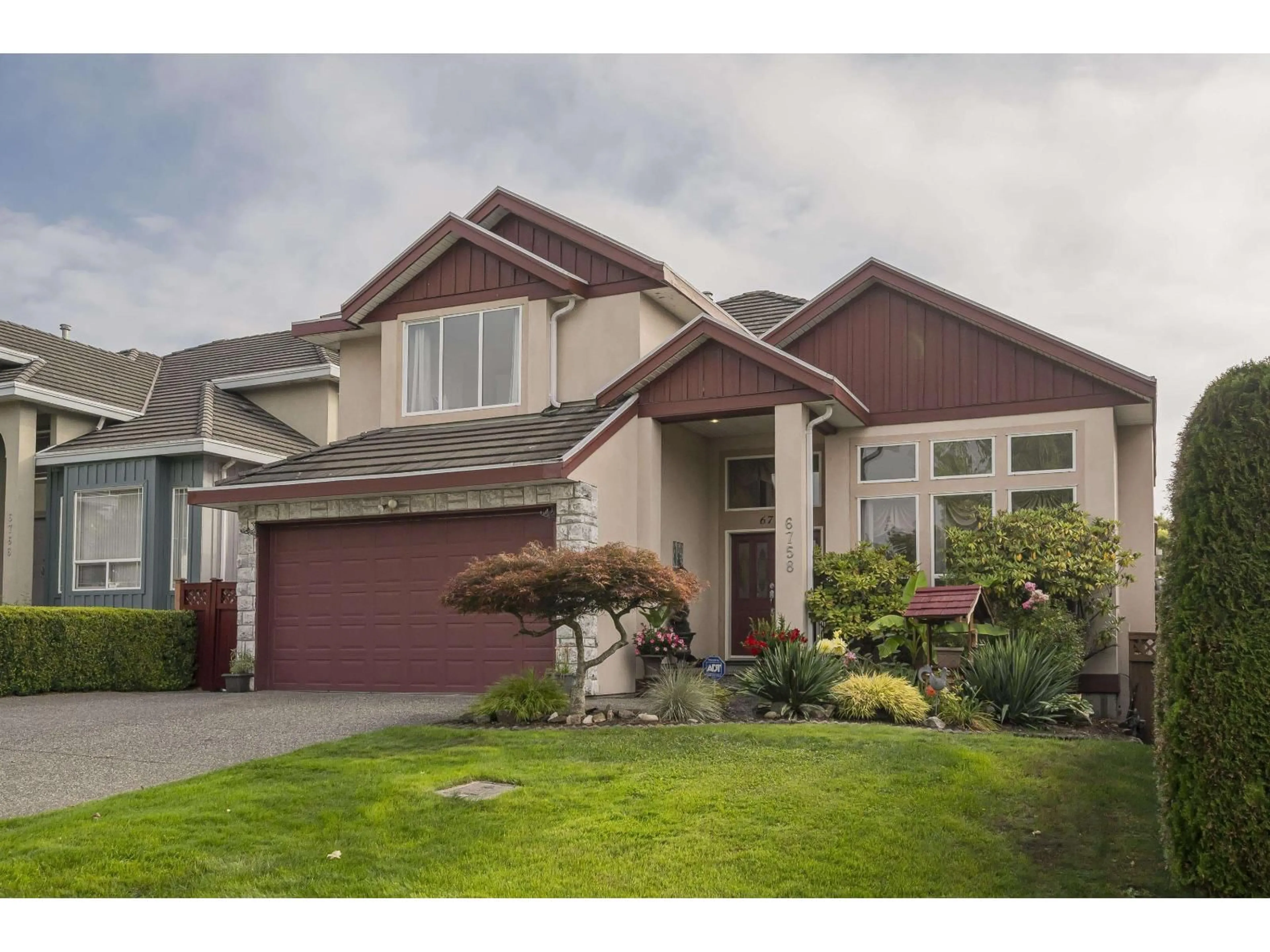 Home with vinyl exterior material, street for 6758 150 STREET, Surrey British Columbia V3S9G8