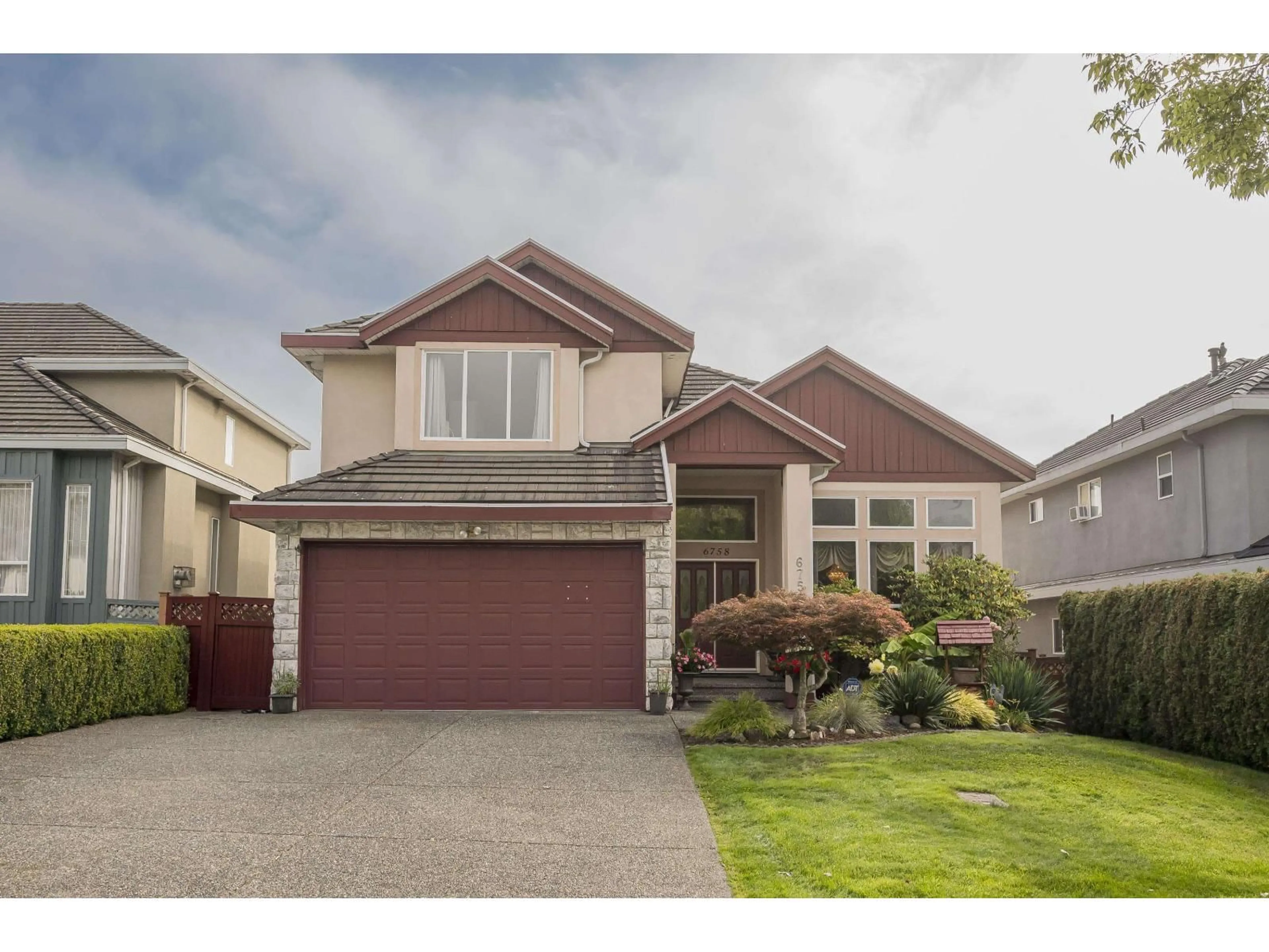 Home with vinyl exterior material, street for 6758 150 STREET, Surrey British Columbia V3S9G8