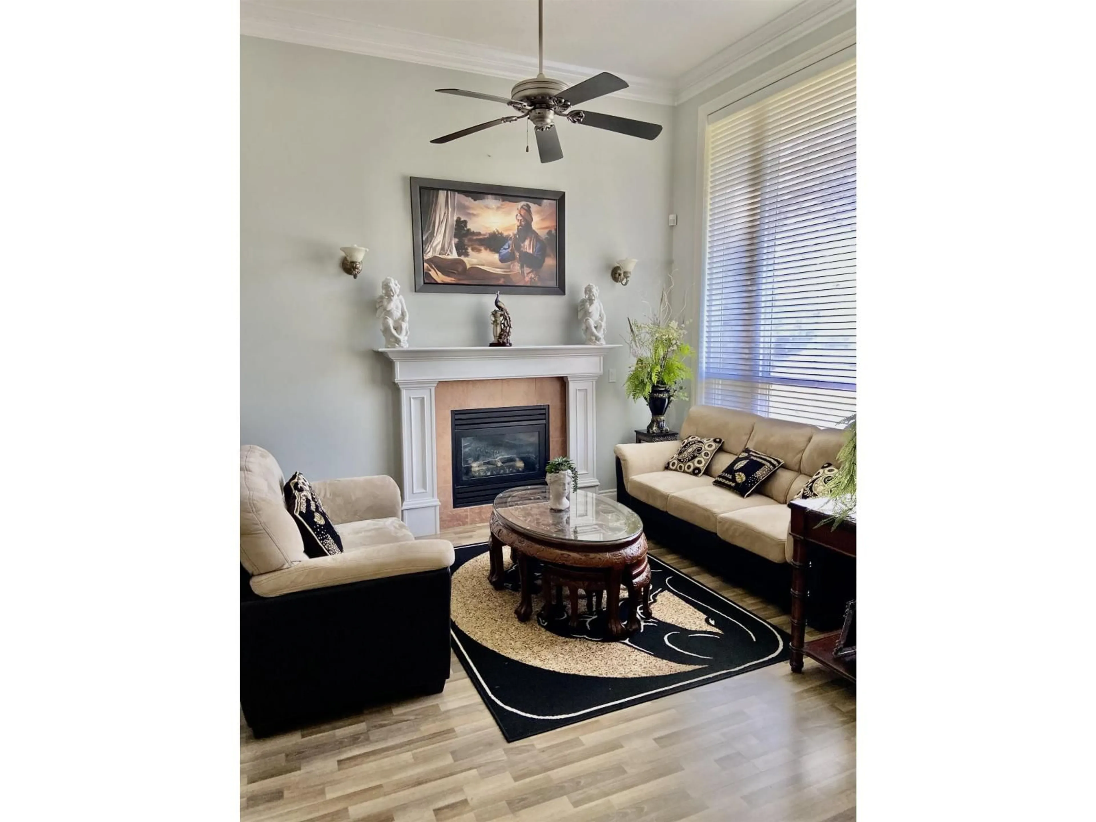 Living room with furniture, wood/laminate floor for 16072 96A AVENUE, Surrey British Columbia V4N3K8