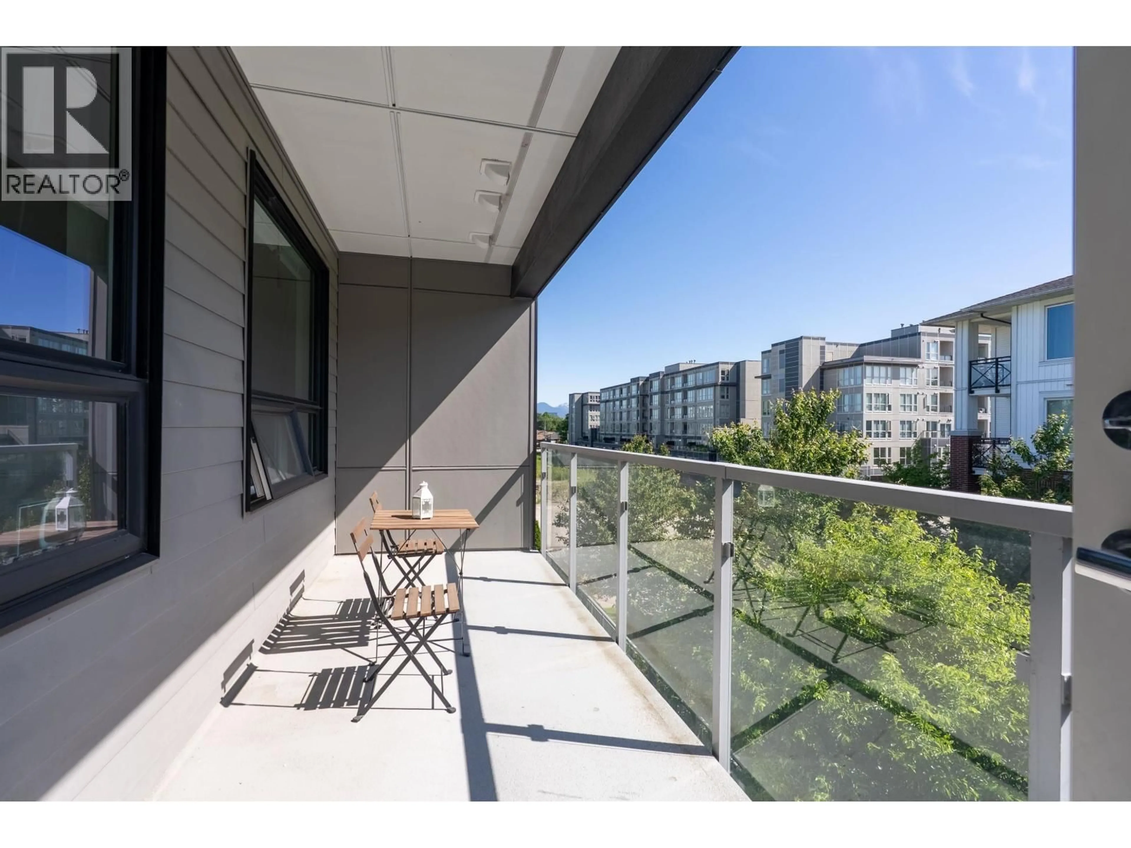 Balcony in the apartment, city buildings view from balcony for 315 - 9233 ODLIN ROAD, Richmond British Columbia V6X0V4