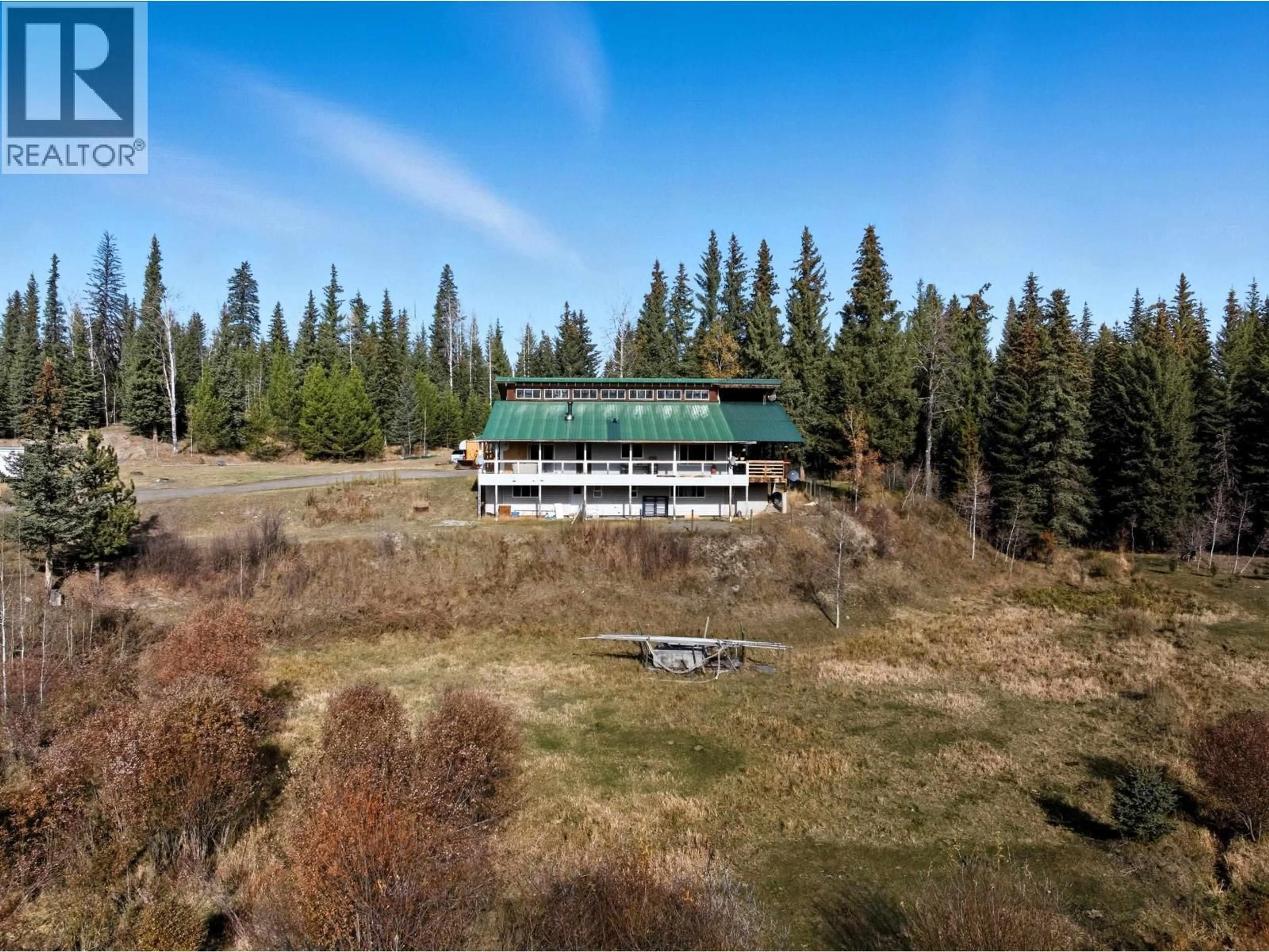 A pic from outside/outdoor area/front of a property/back of a property/a pic from drone, unknown for 6391 HOUSEMAN ROAD, 100 Mile House British Columbia V0K1G0