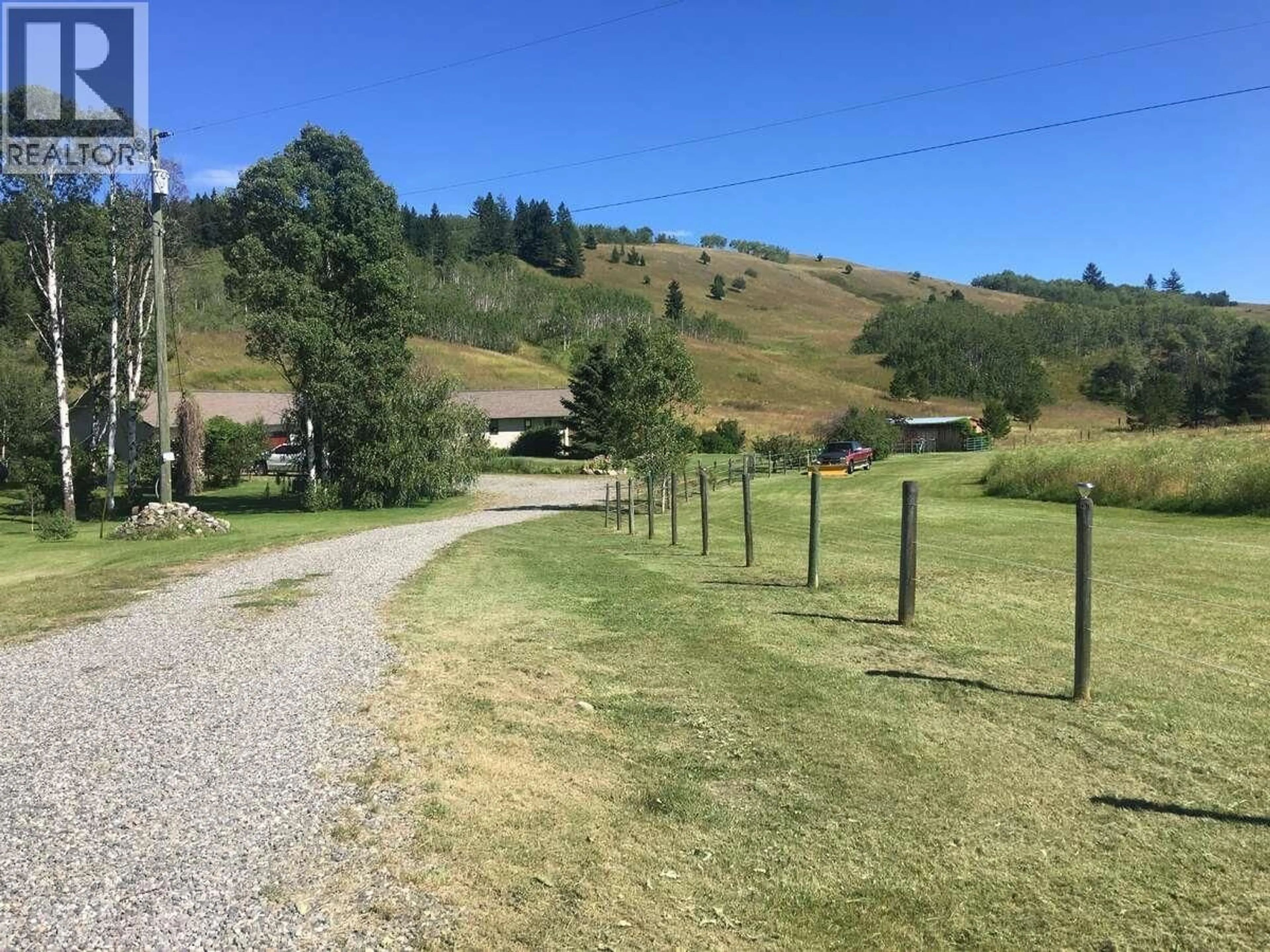 A pic from outside/outdoor area/front of a property/back of a property/a pic from drone, mountain view for 4221 LODGE ROAD, Lac La Hache British Columbia V0K1T0