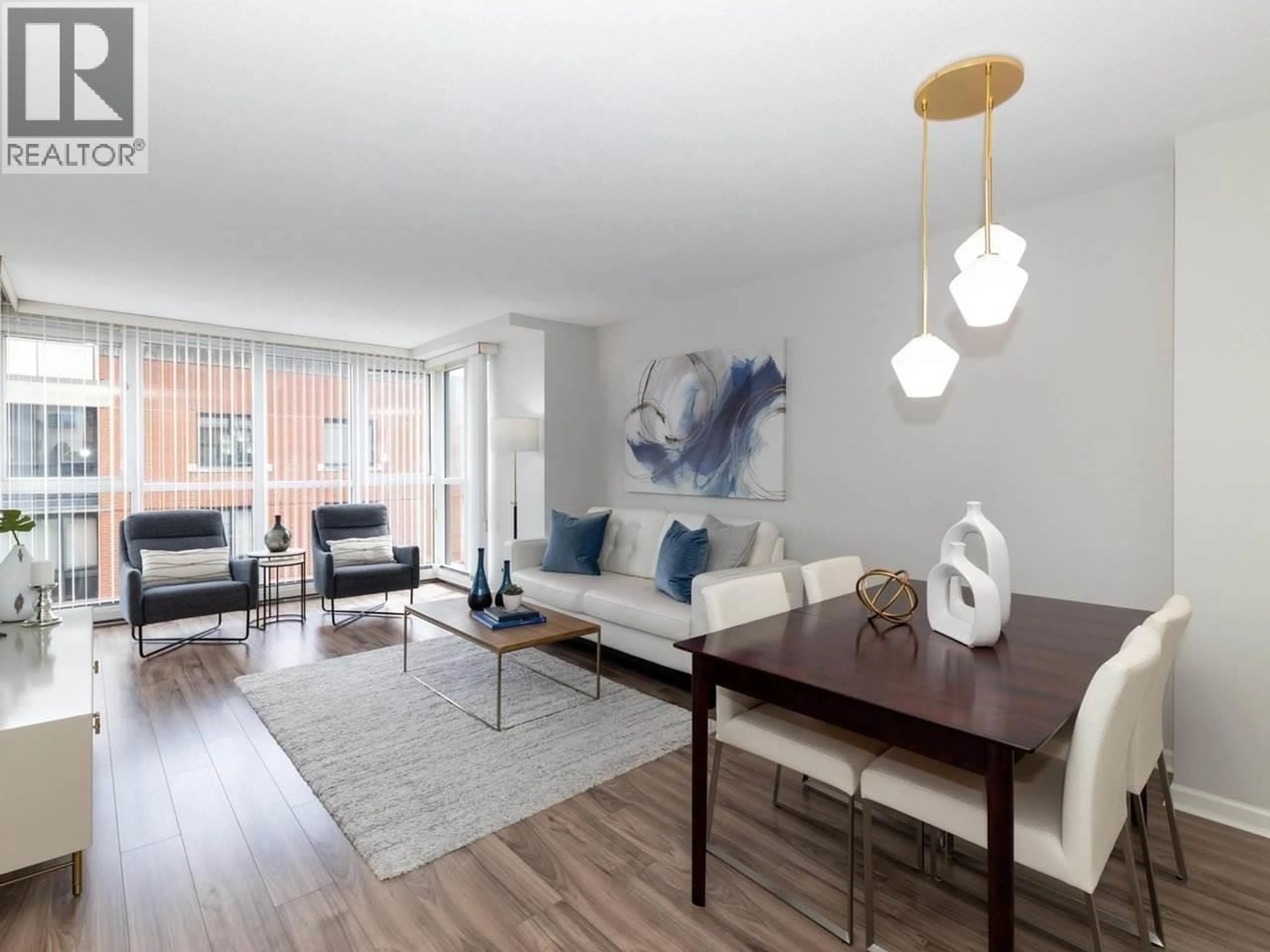 Living room with furniture, wood/laminate floor for 10A - 199 DRAKE STREET, Vancouver British Columbia V6Z2T9