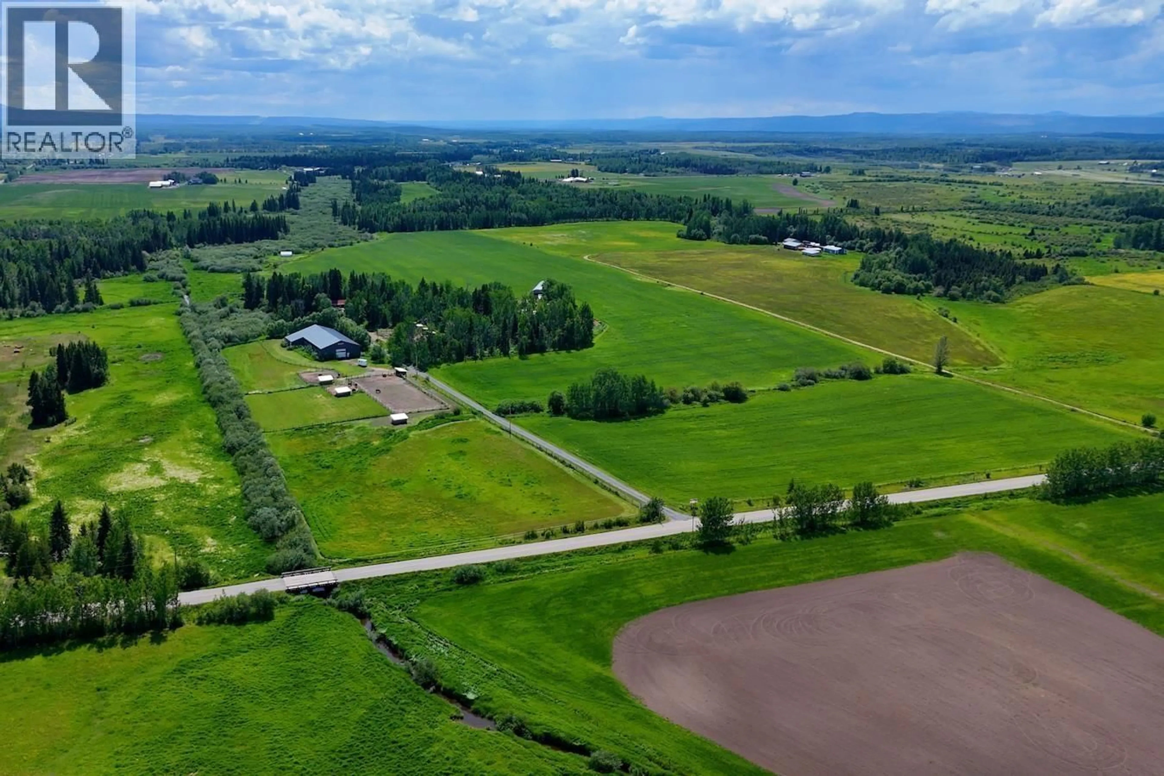 A pic from outside/outdoor area/front of a property/back of a property/a pic from drone, water/lake/river/ocean view for 9345 CUMMINGS ROAD, Prince George British Columbia V2N5W7