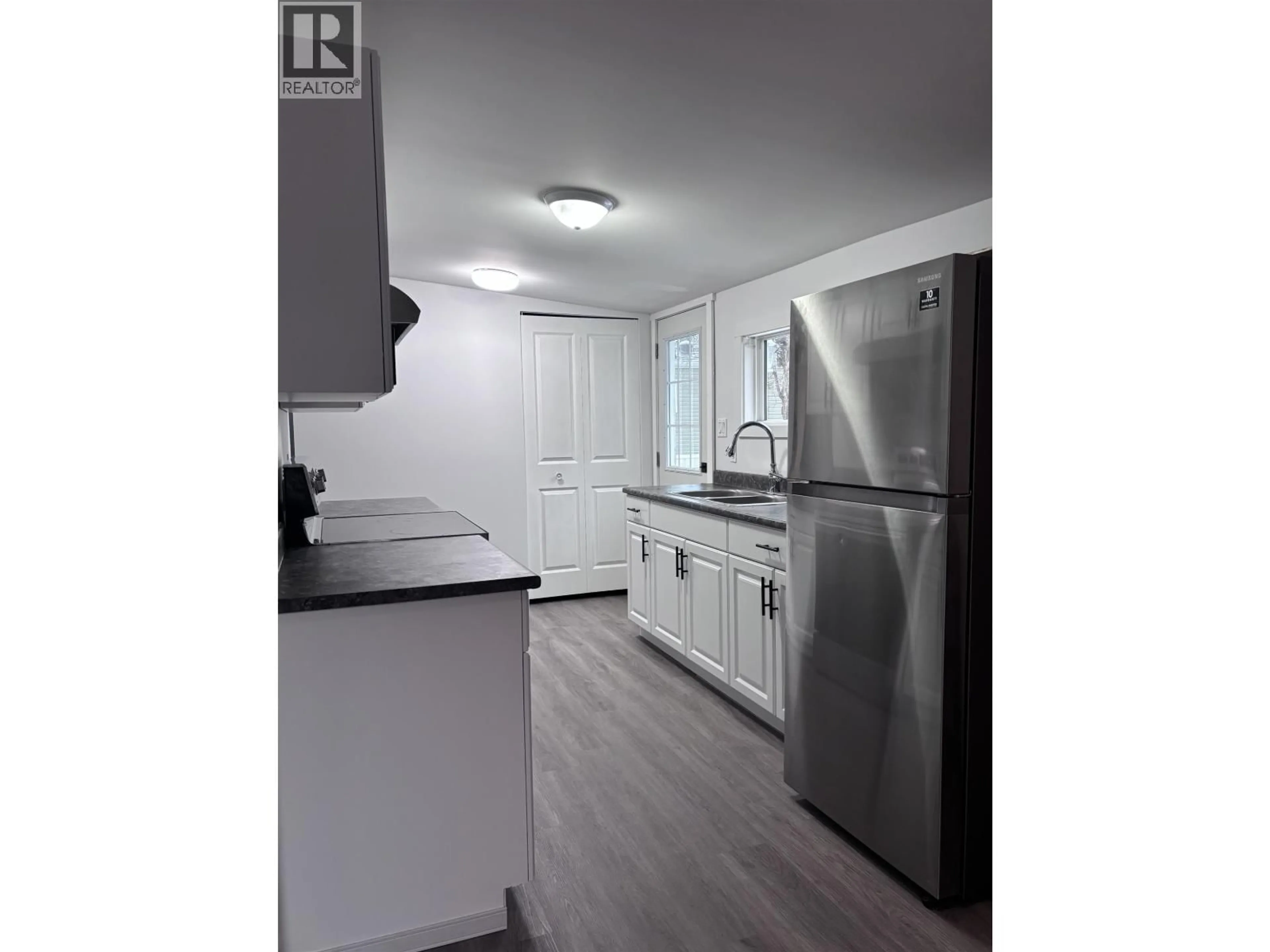 Standard kitchen, wood/laminate floor for 4670 COPPER RIVER ROAD, Terrace British Columbia V8G0A5