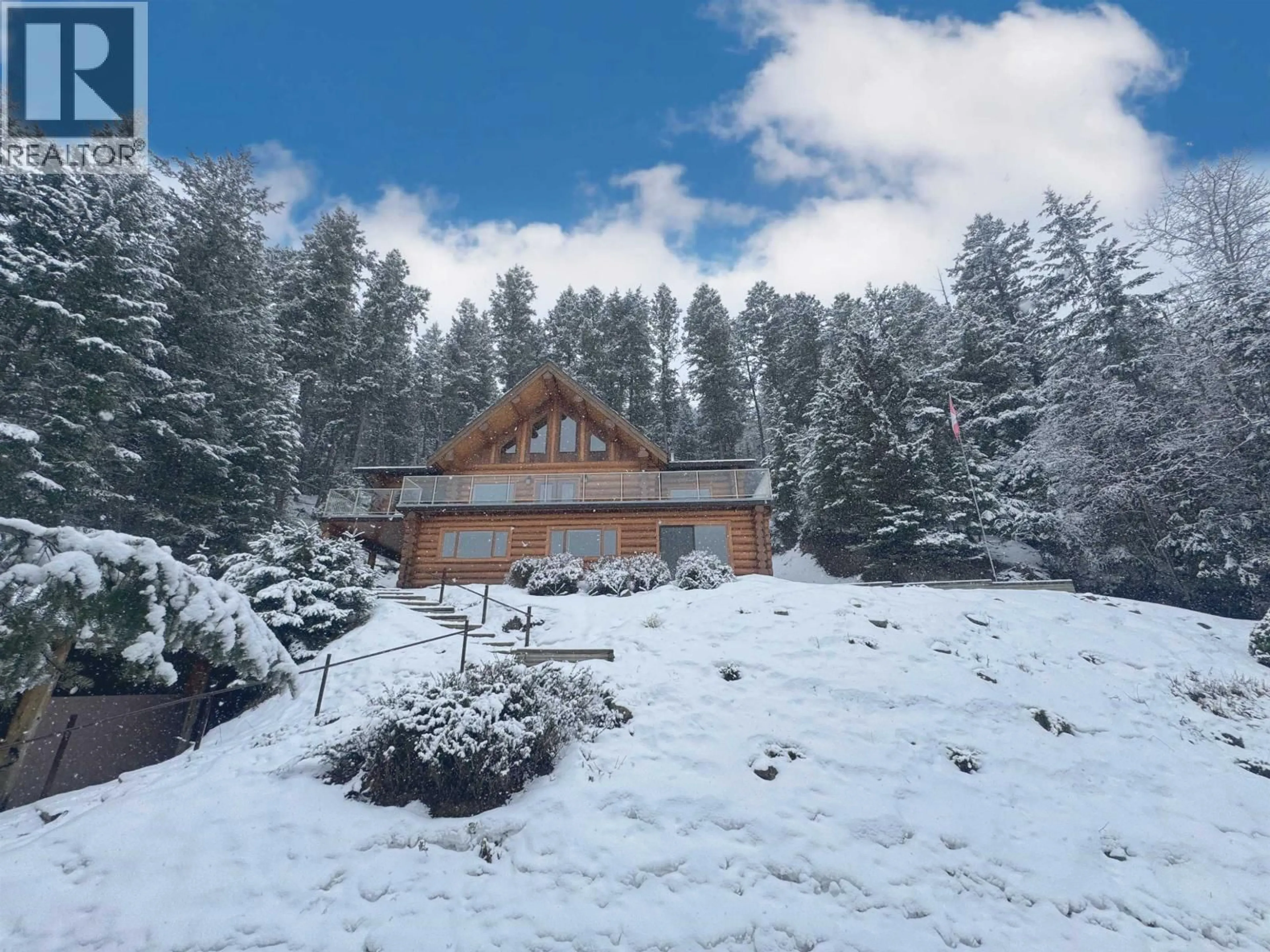 A pic from outside/outdoor area/front of a property/back of a property/a pic from drone, mountain view for 5278 KALLUM DRIVE, 108 Mile Ranch British Columbia V0K2Z0