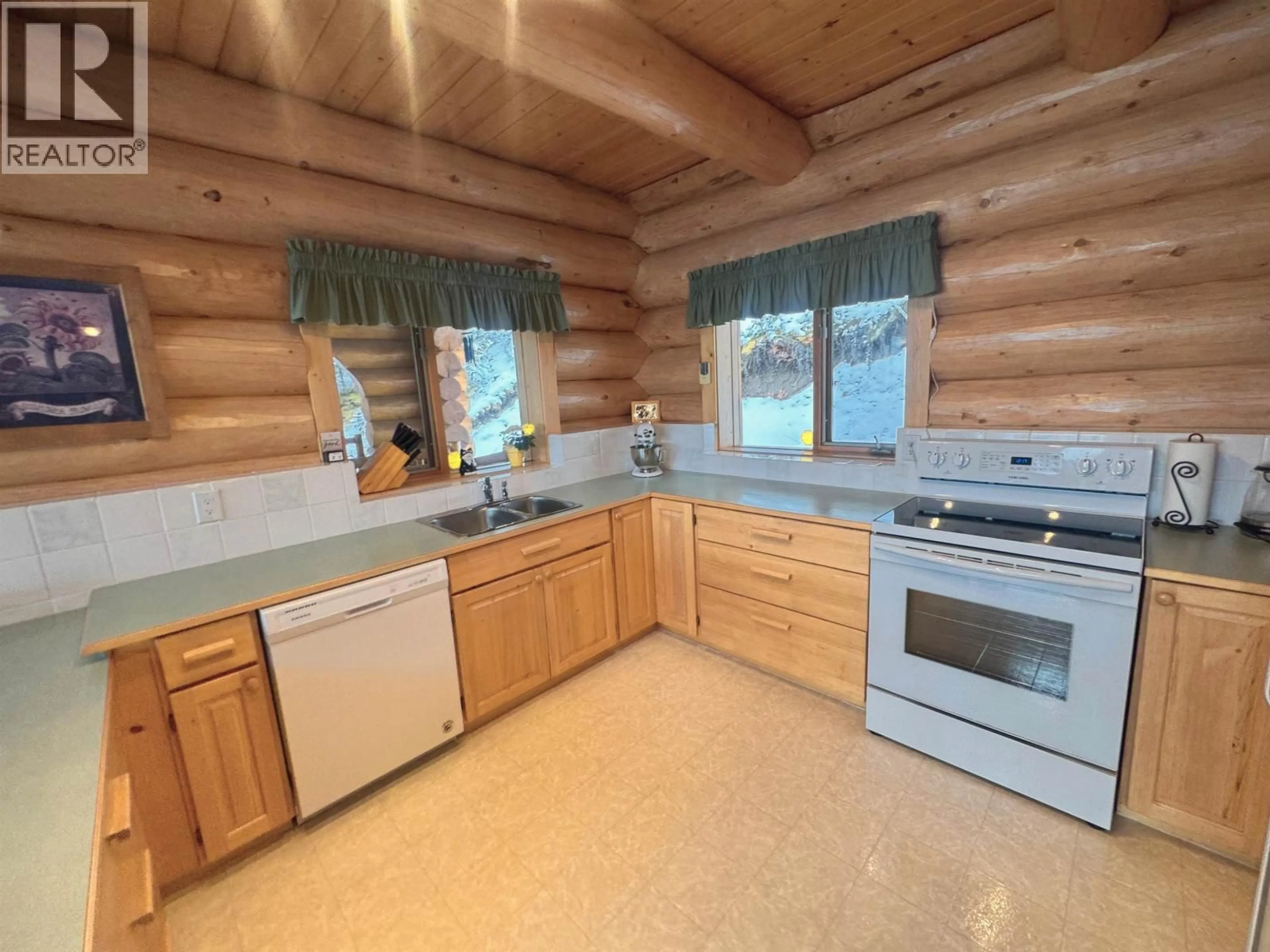 Standard kitchen, wood/laminate floor for 5278 KALLUM DRIVE, 108 Mile Ranch British Columbia V0K2Z0