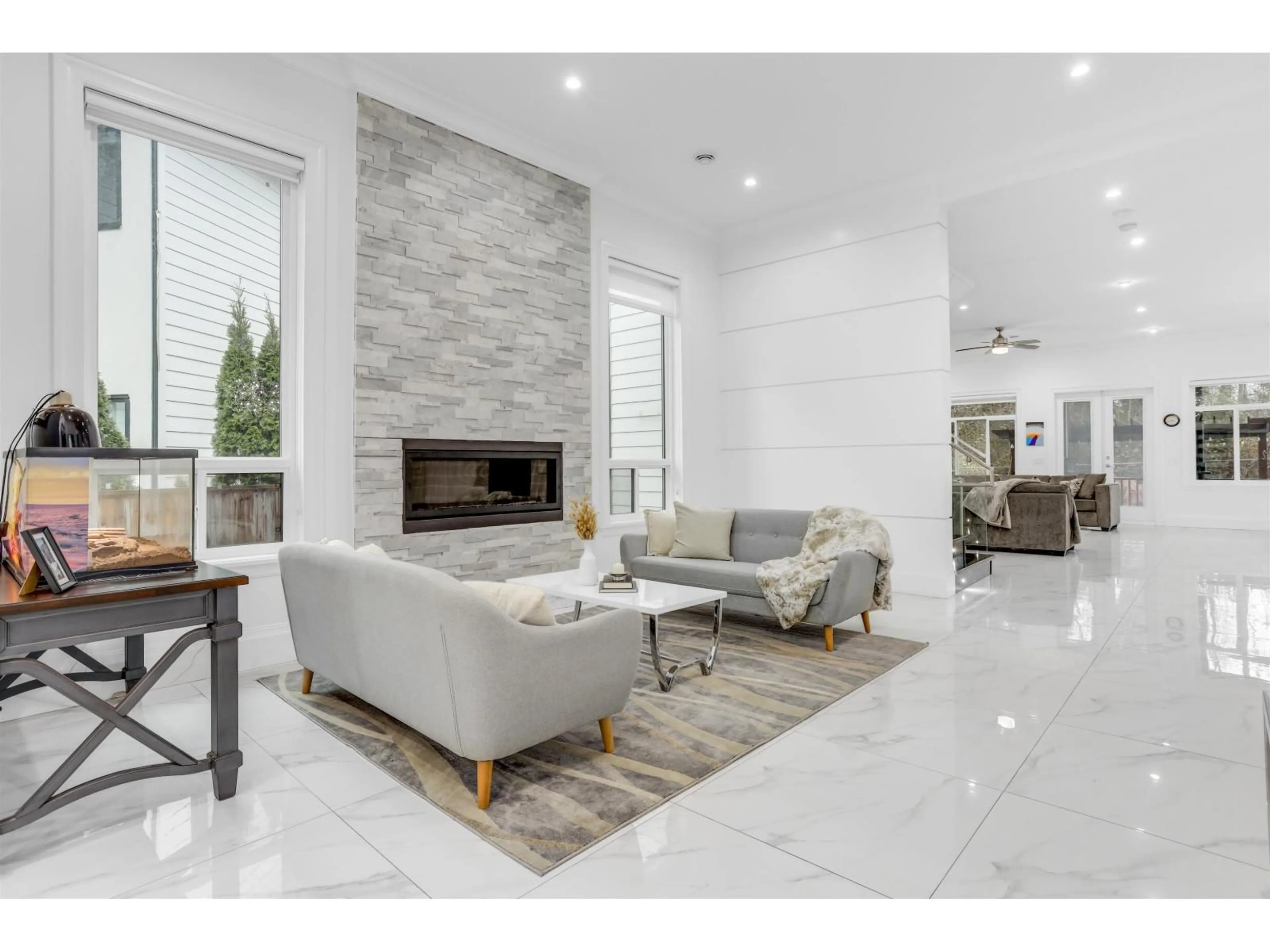 Living room with furniture, ceramic/tile floor for 7869 167 STREET, Surrey British Columbia V4N0L9