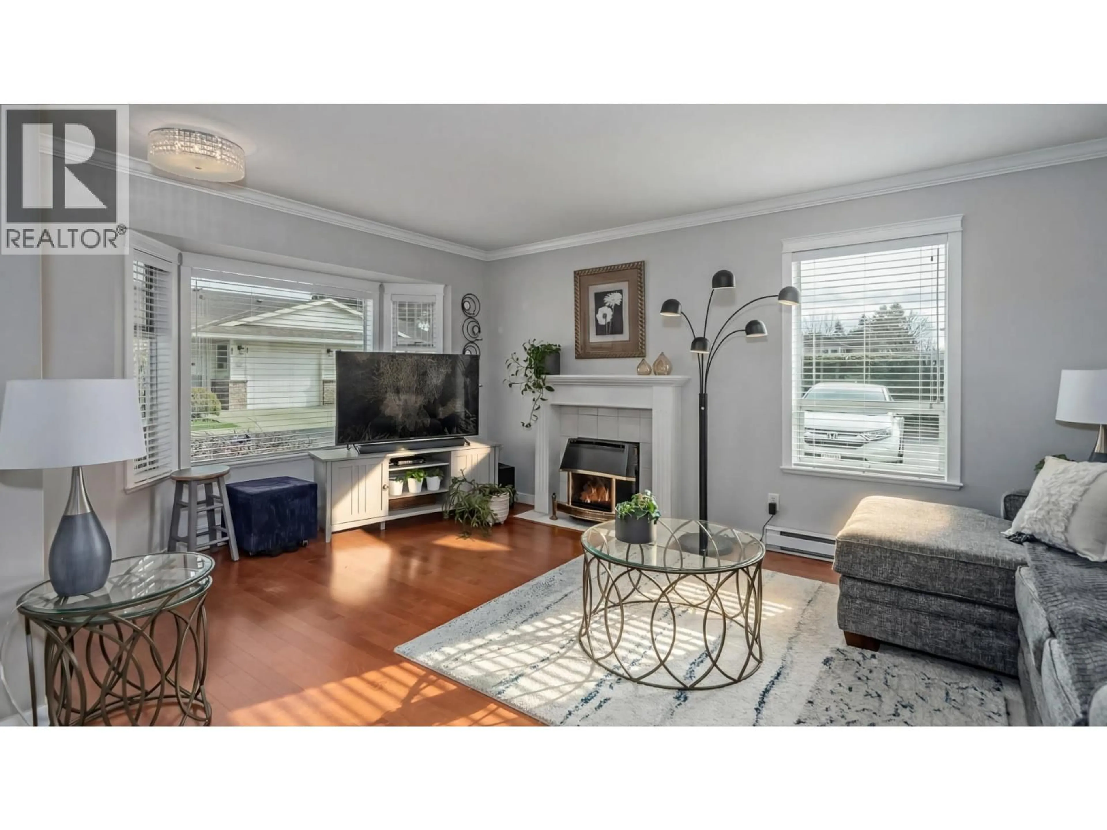 Living room with furniture, wood/laminate floor for 25 - 12276 189A AVENUE, Pitt Meadows British Columbia V3Y2G2