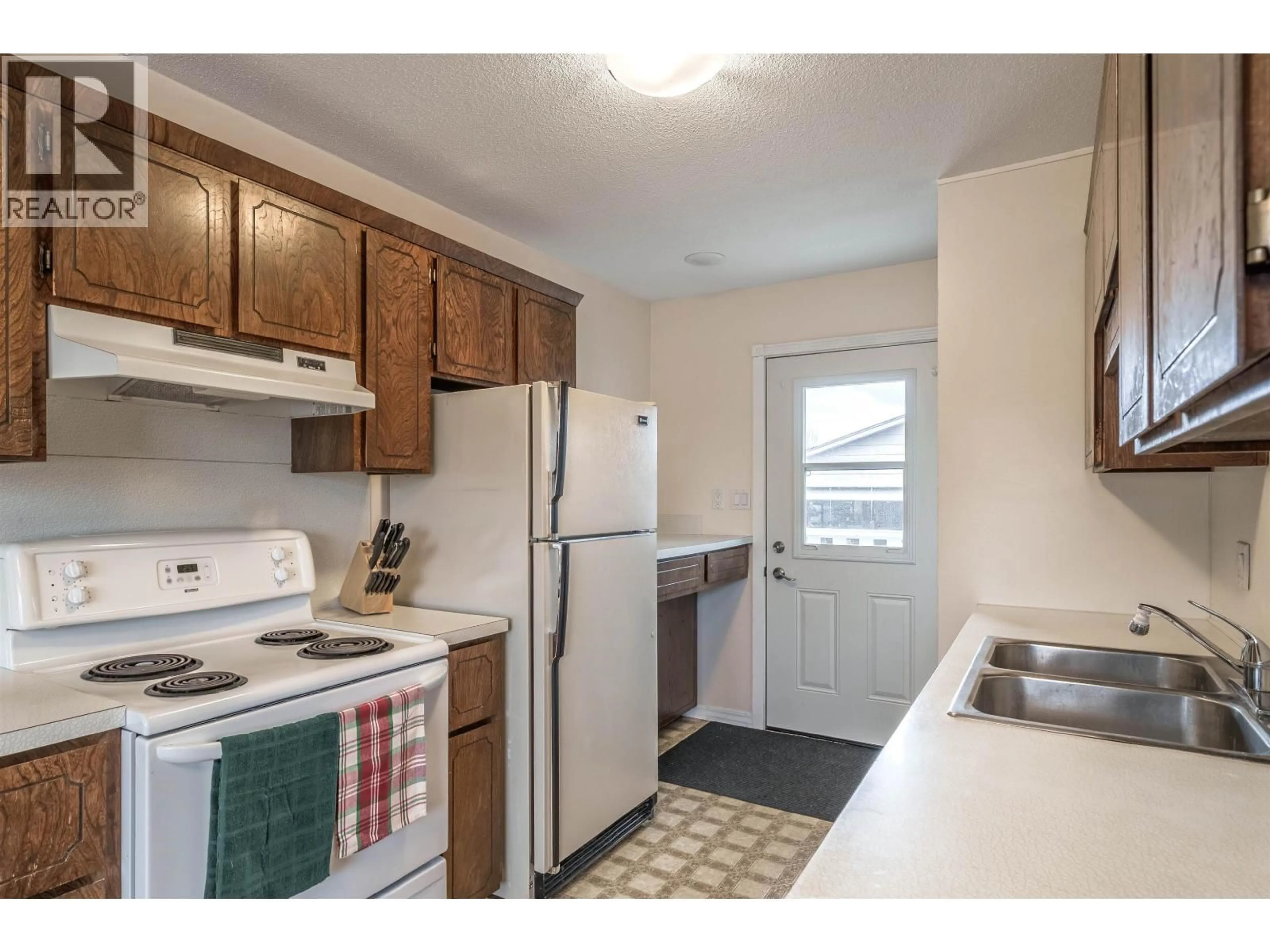 Standard kitchen, unknown for 240 DOGWOOD AVENUE, 100 Mile House British Columbia V0K2E0
