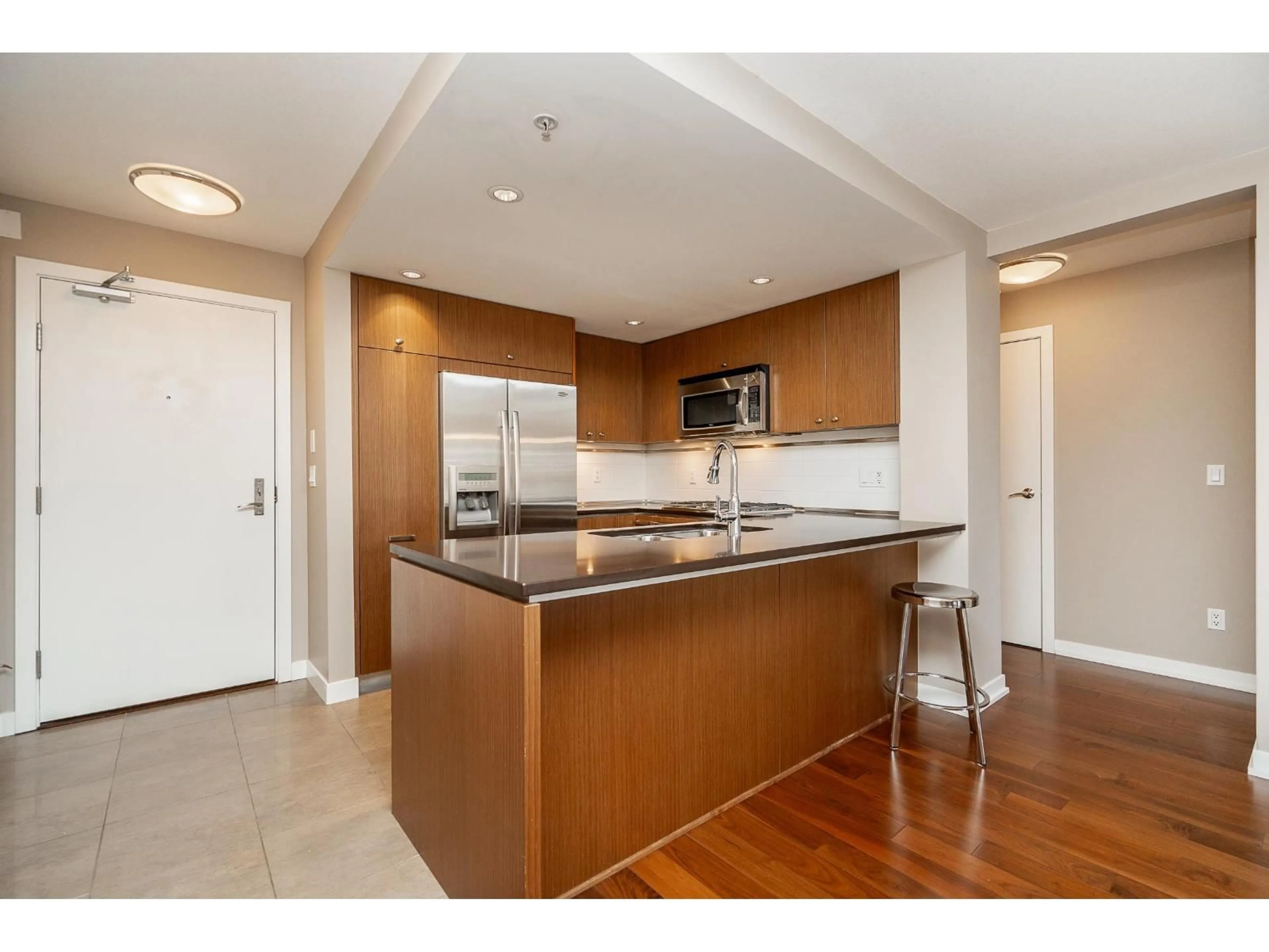Open concept kitchen, unknown for 303 - 2950 KING GEORGE BOULEVARD, Surrey British Columbia V4P0E5