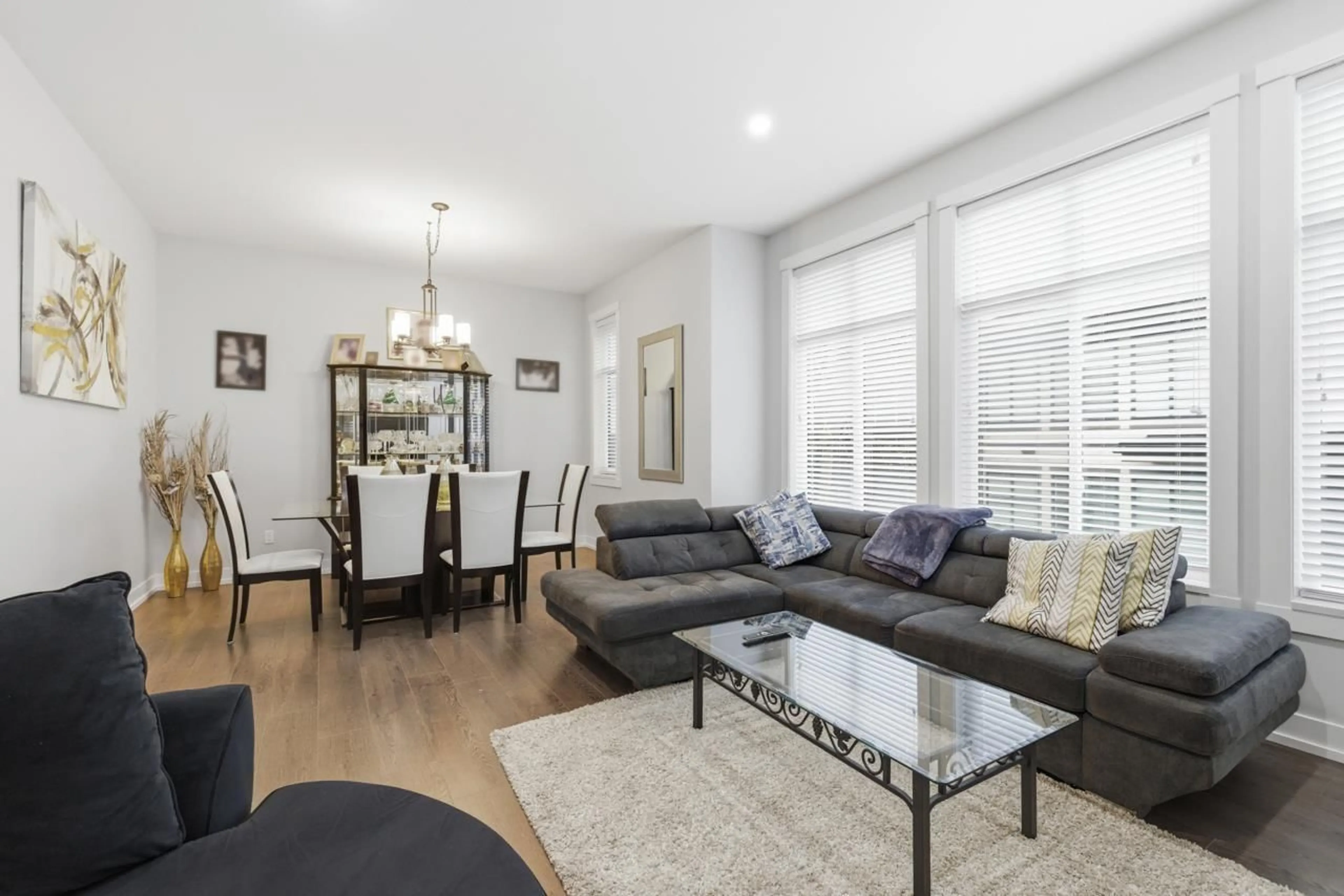 Living room with furniture, wood/laminate floor for 8 - 2687 158 STREET, Surrey British Columbia V3Z6V3