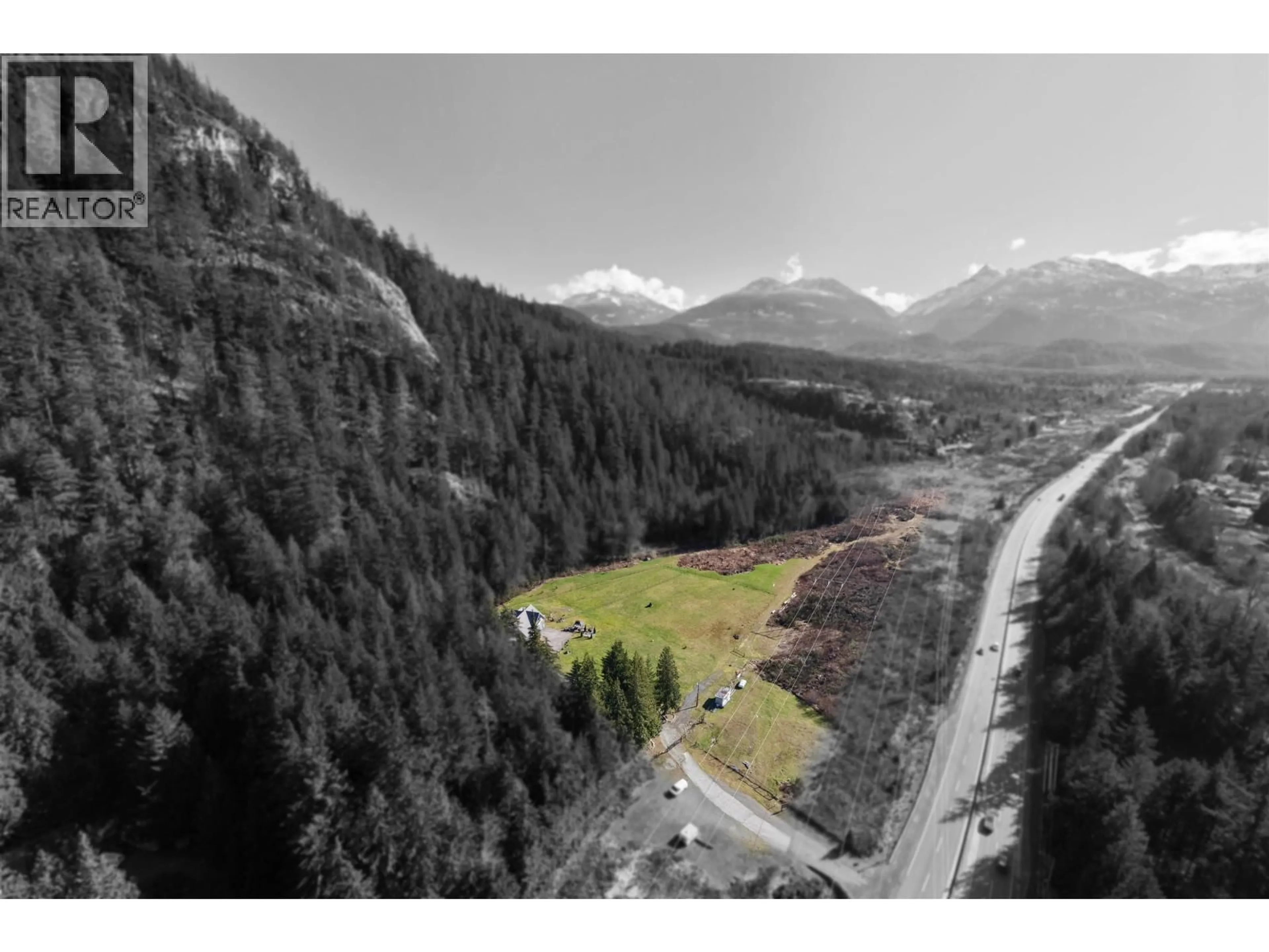 A pic from outside/outdoor area/front of a property/back of a property/a pic from drone, mountain view for 4000 HIGHWAY 99, Squamish British Columbia V0N1H0