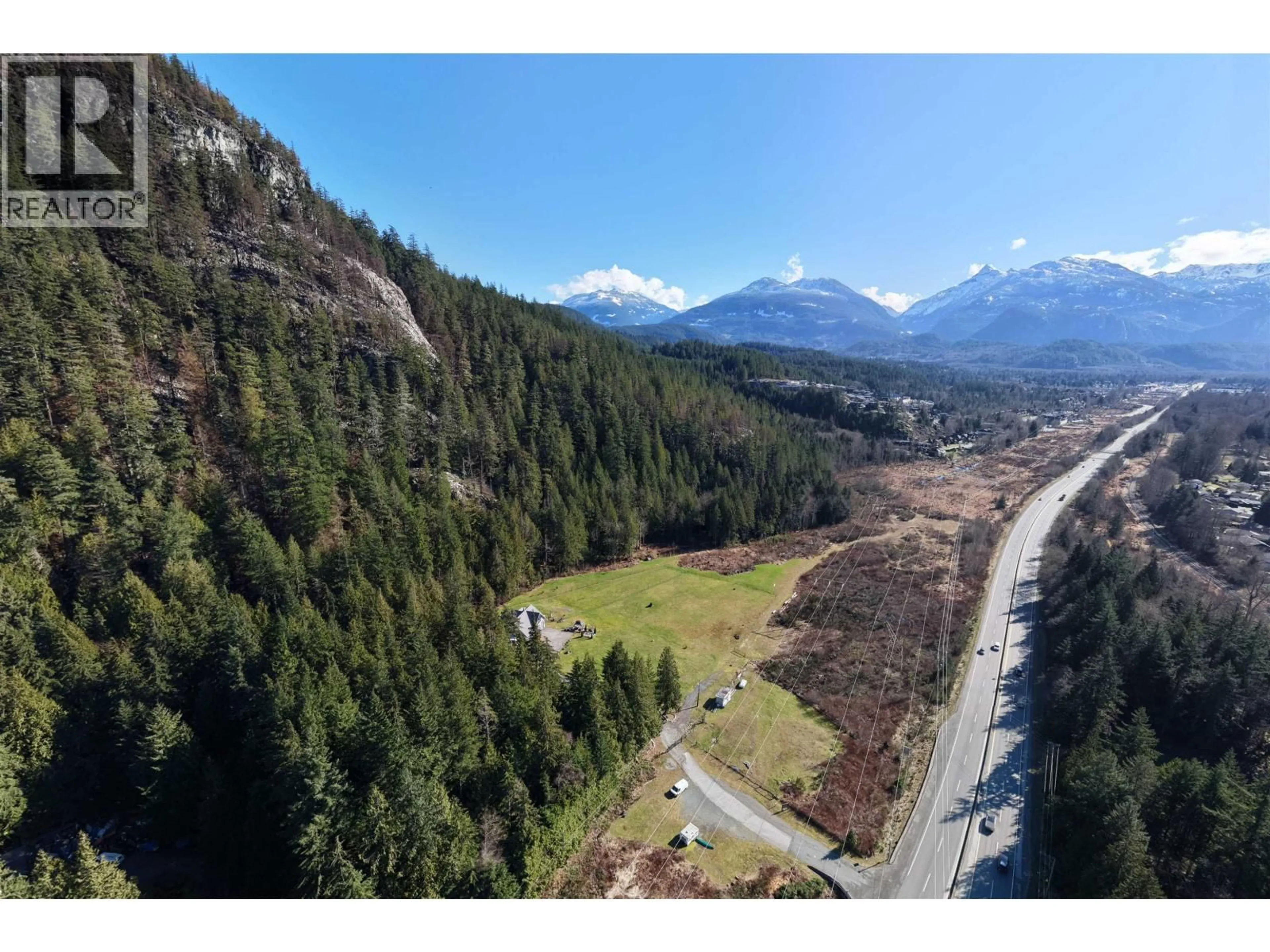 A pic from outside/outdoor area/front of a property/back of a property/a pic from drone, mountain view for 4000 HIGHWAY 99, Squamish British Columbia V0N1H0