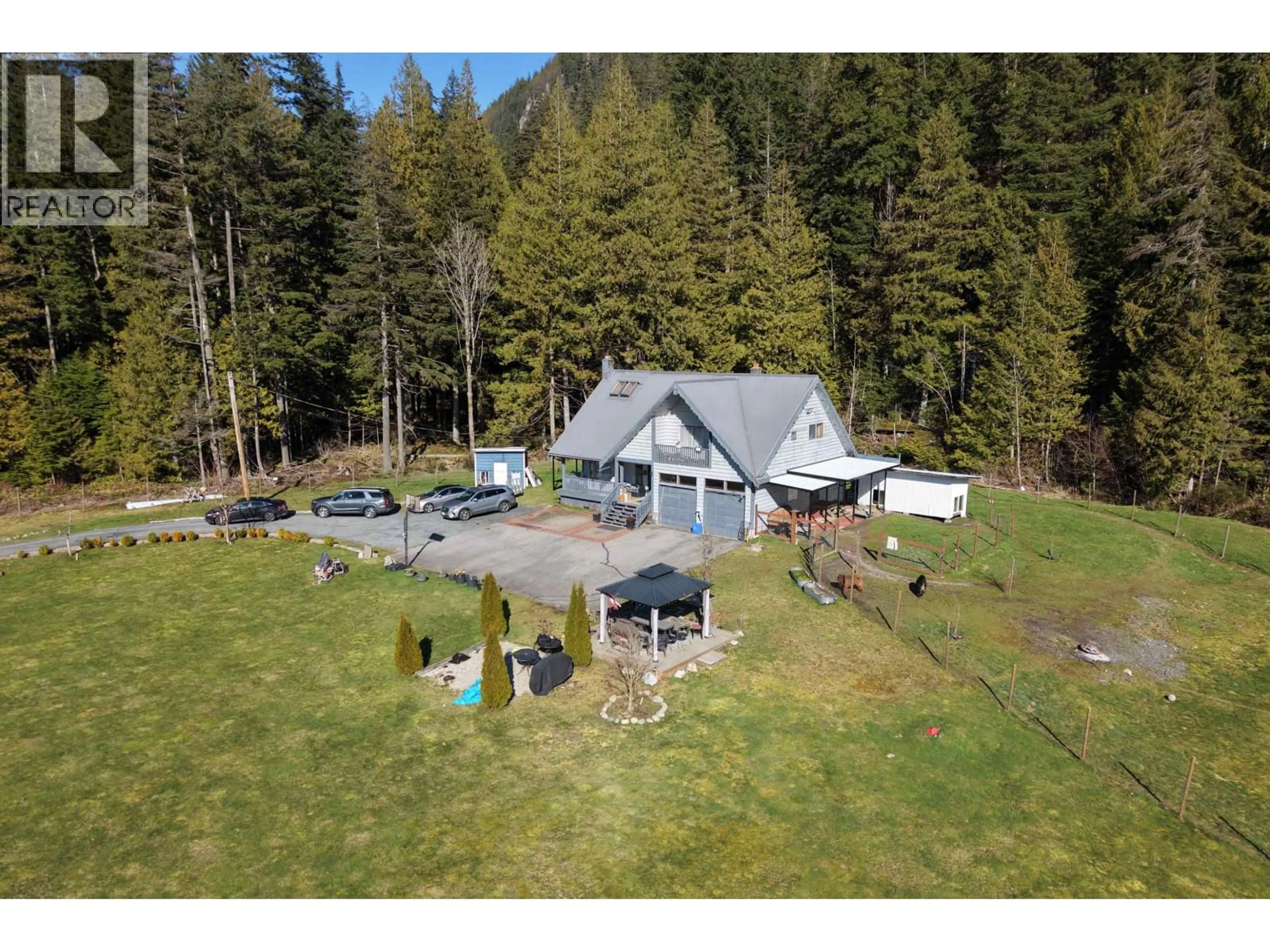 A pic from outside/outdoor area/front of a property/back of a property/a pic from drone, water/lake/river/ocean view for 4000 HIGHWAY 99, Squamish British Columbia V0N1H0