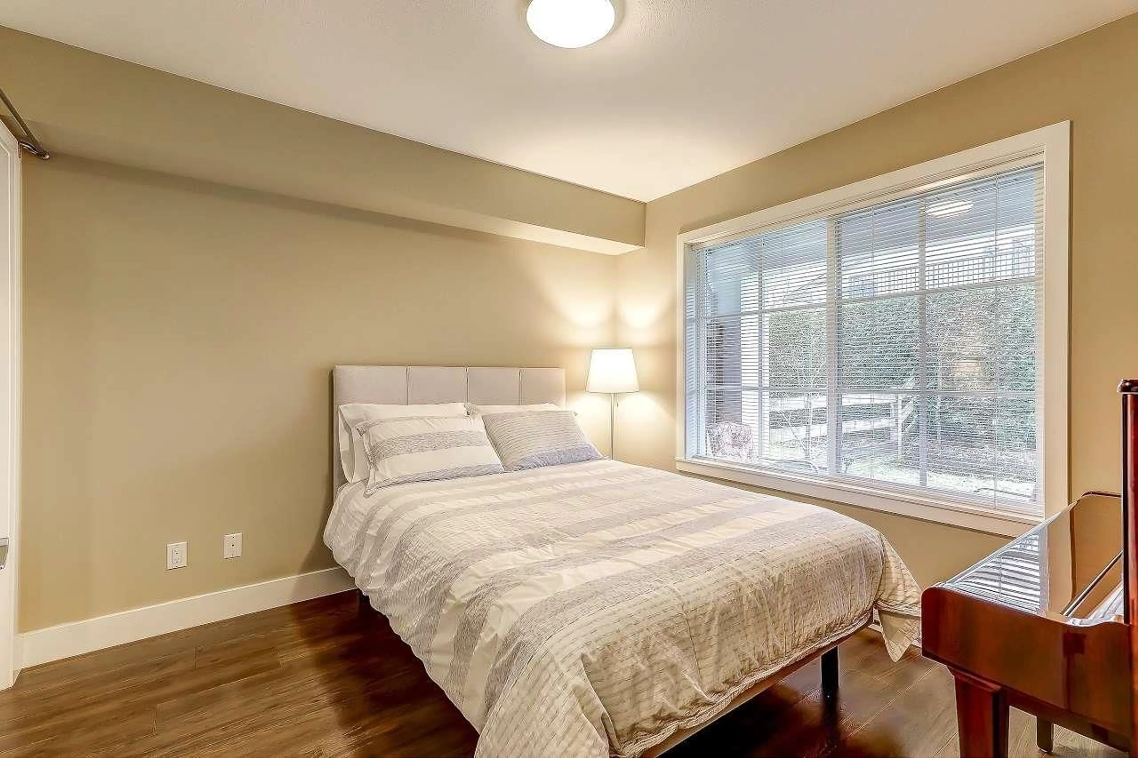 Bedroom with bed, wood/laminate floor for 40 - 2450 161A STREET, Surrey British Columbia V3Z8K4