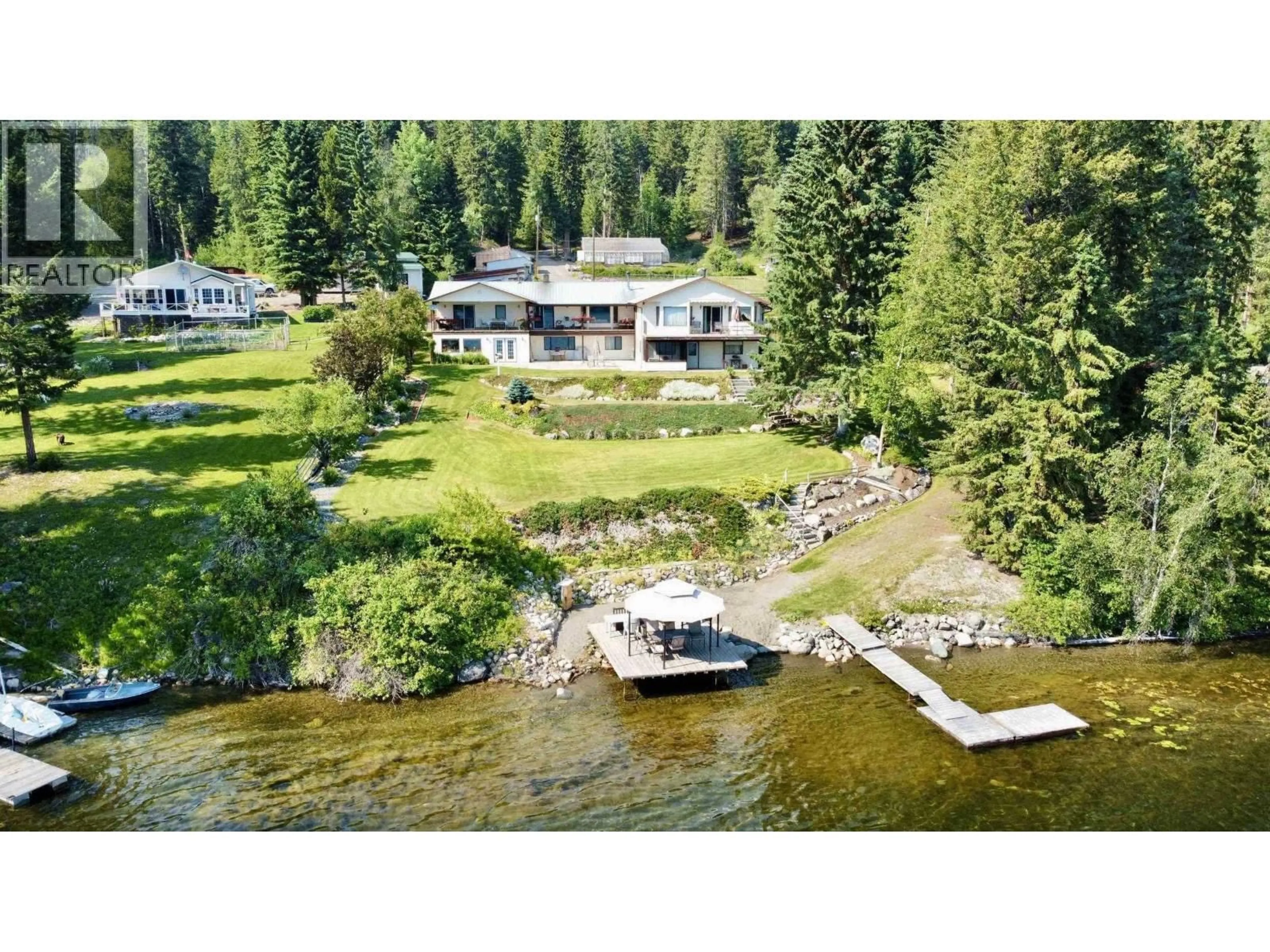 A pic from outside/outdoor area/front of a property/back of a property/a pic from drone, water/lake/river/ocean view for 5790 TIMOTHY LAKE ROAD, Lac La Hache British Columbia V0K1T0
