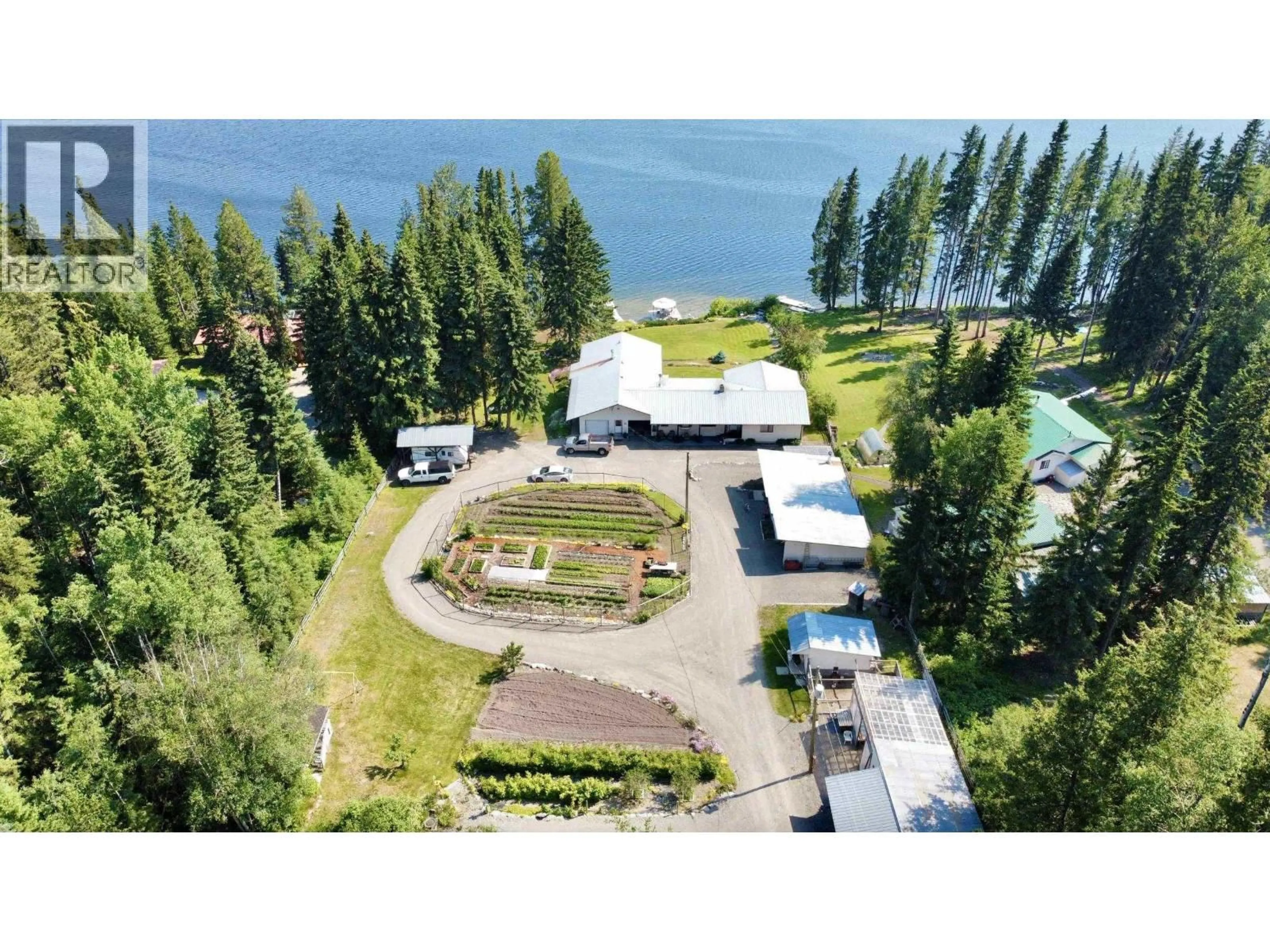 A pic from outside/outdoor area/front of a property/back of a property/a pic from drone, water/lake/river/ocean view for 5790 TIMOTHY LAKE ROAD, Lac La Hache British Columbia V0K1T0