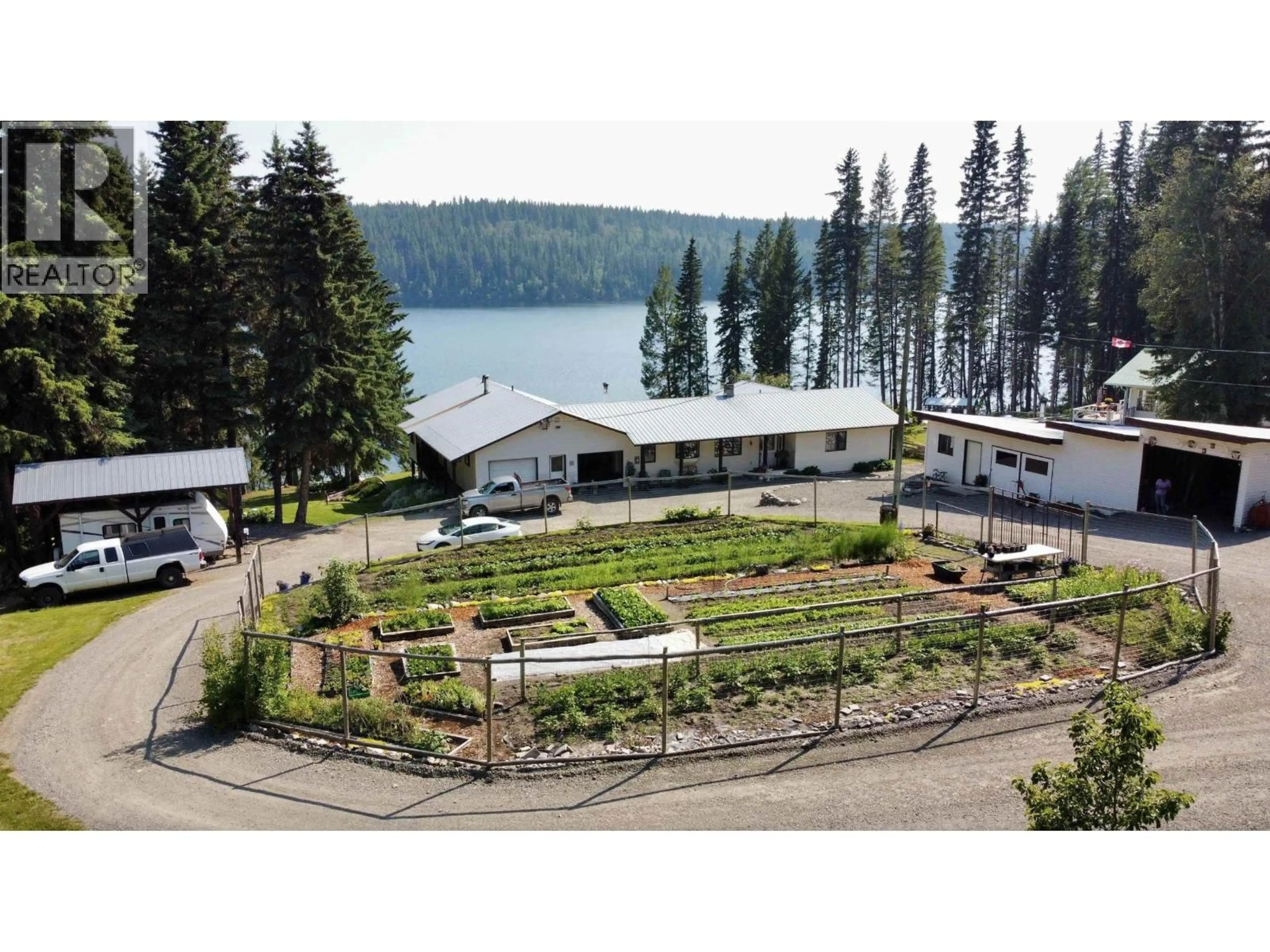 A pic from outside/outdoor area/front of a property/back of a property/a pic from drone, water/lake/river/ocean view for 5790 TIMOTHY LAKE ROAD, Lac La Hache British Columbia V0K1T0