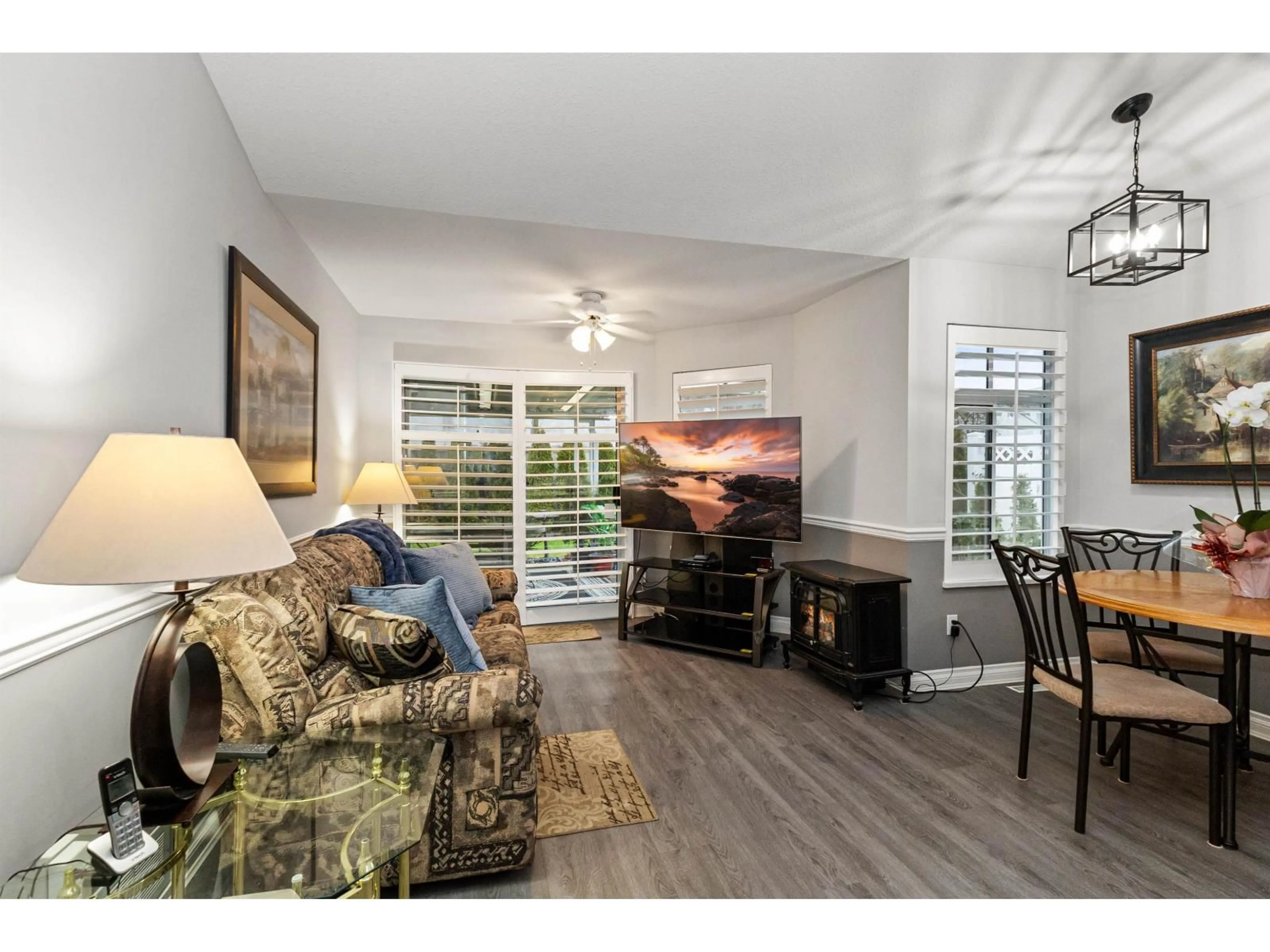 Living room with furniture, wood/laminate floor for 49 - 19649 53RD AVENUE, Langley British Columbia V3A8C5