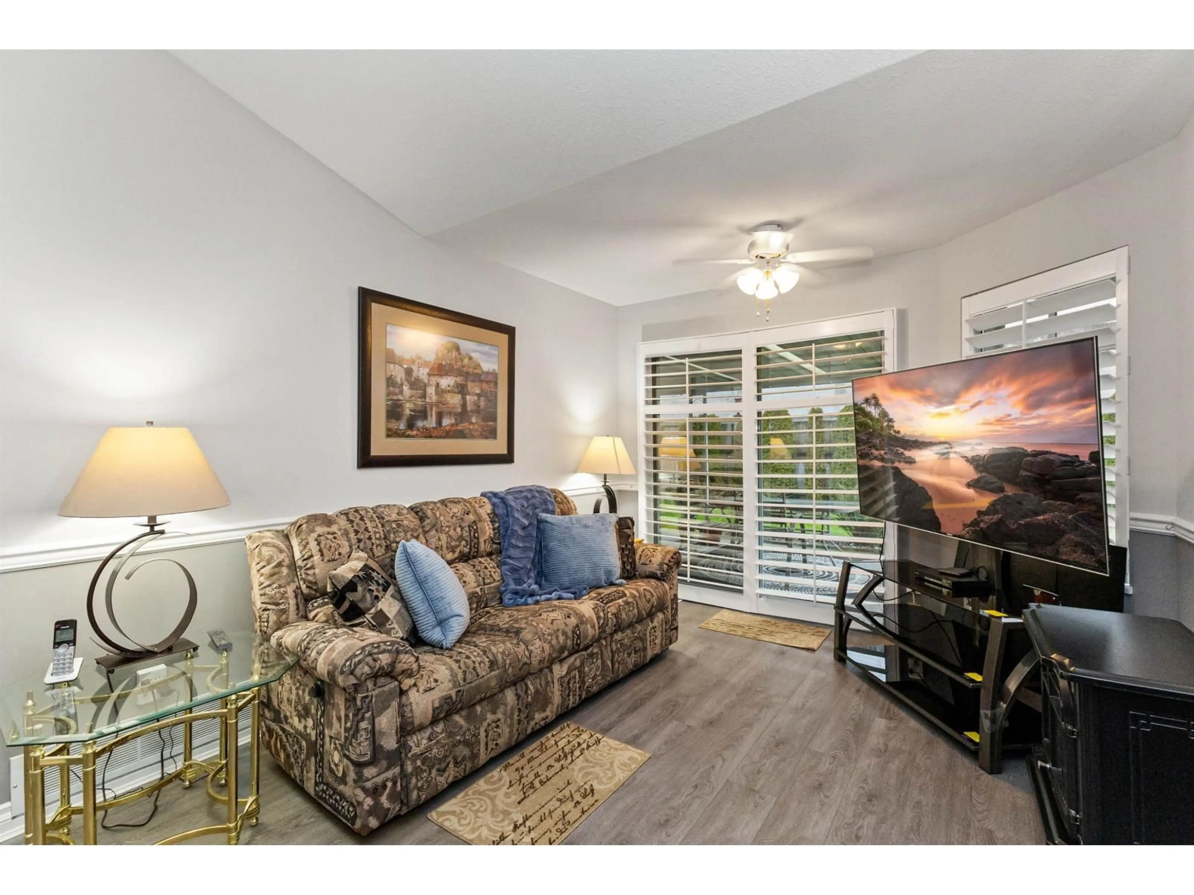 Living room with furniture, wood/laminate floor for 49 - 19649 53RD AVENUE, Langley British Columbia V3A8C5