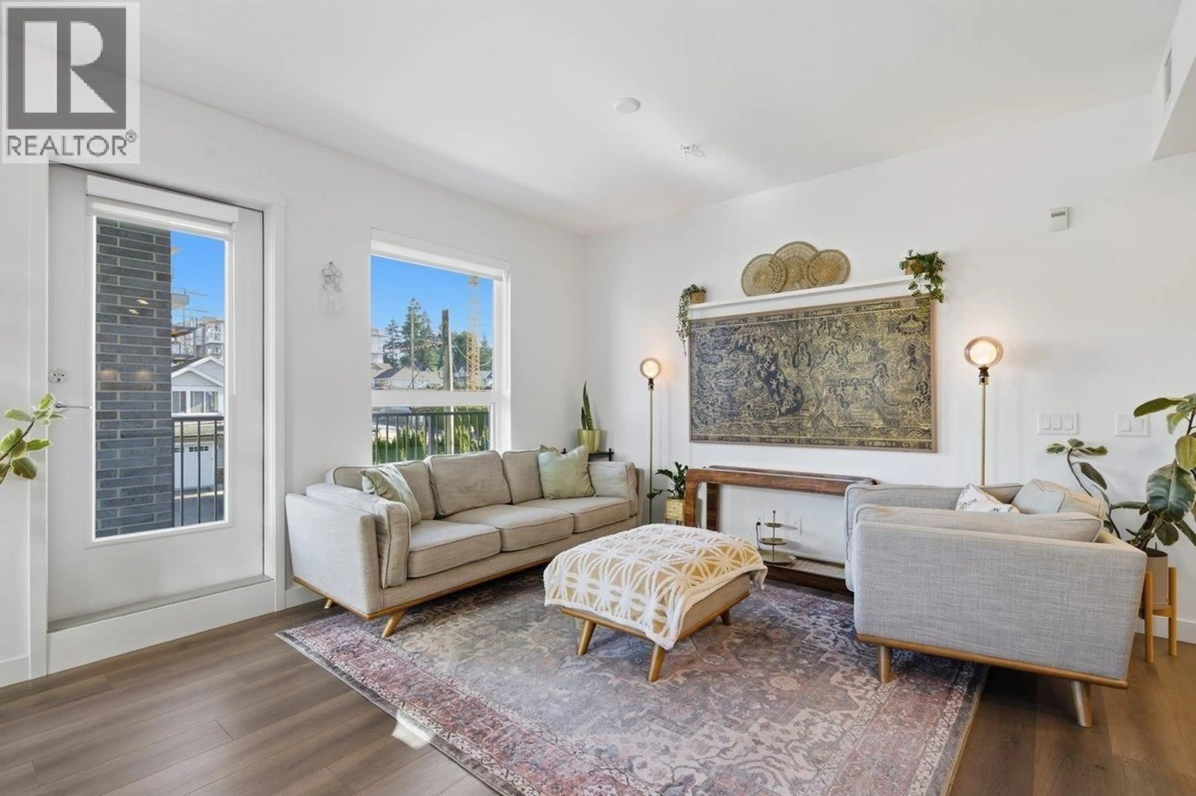 Living room with furniture, unknown for 303 - 645 COMO LAKE AVENUE, Coquitlam British Columbia V3J0N9