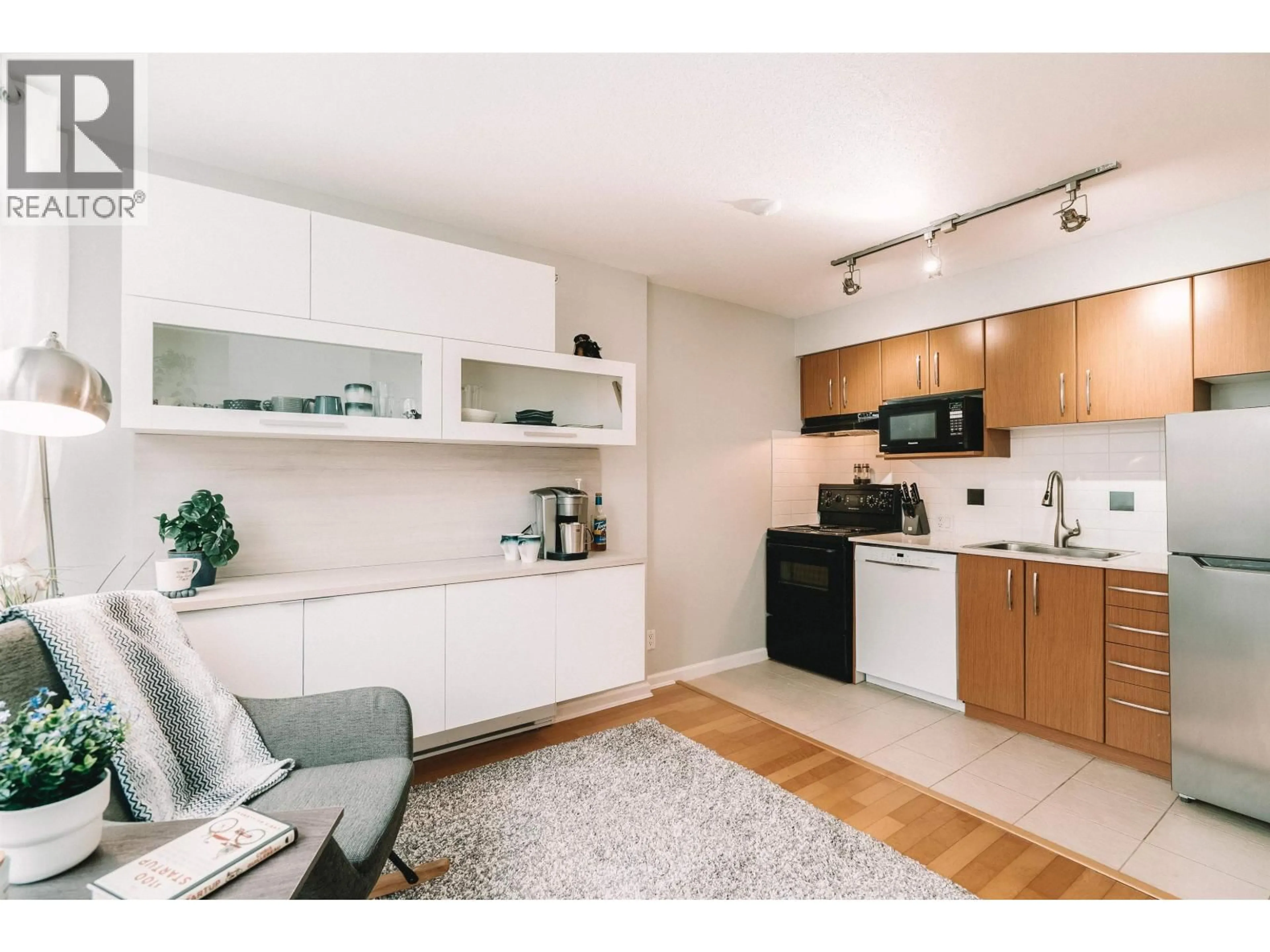 Open concept kitchen, unknown for 302 - 9288 UNIVERSITY CRESCENT, Burnaby British Columbia V5A4X7