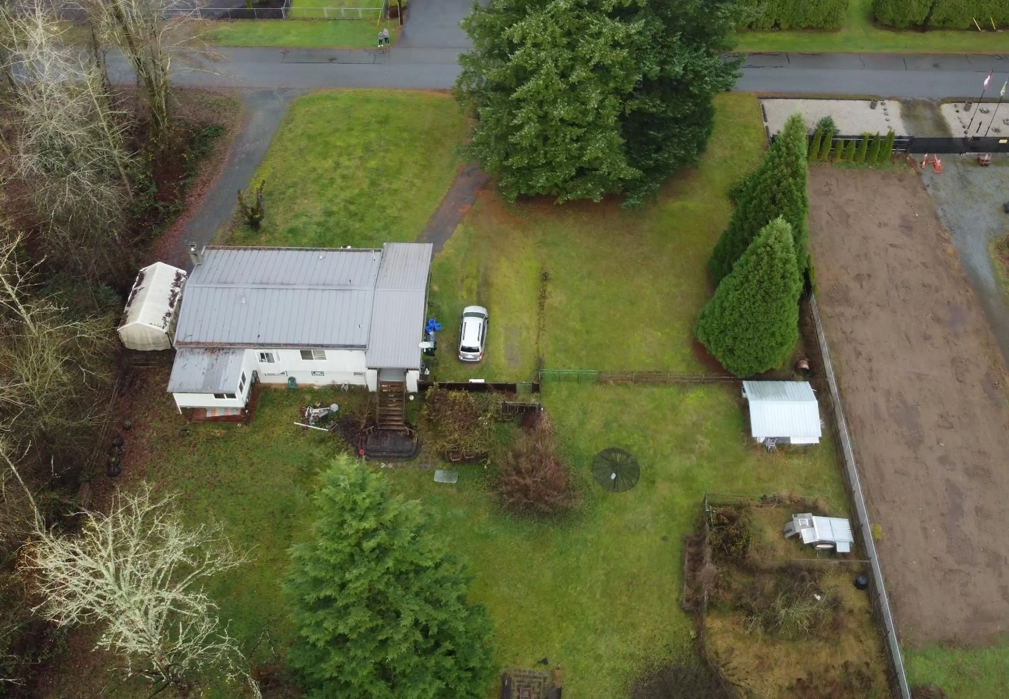 A pic from outside/outdoor area/front of a property/back of a property/a pic from drone, unknown for 24242 52 AVENUE, Langley British Columbia V2Z2N2