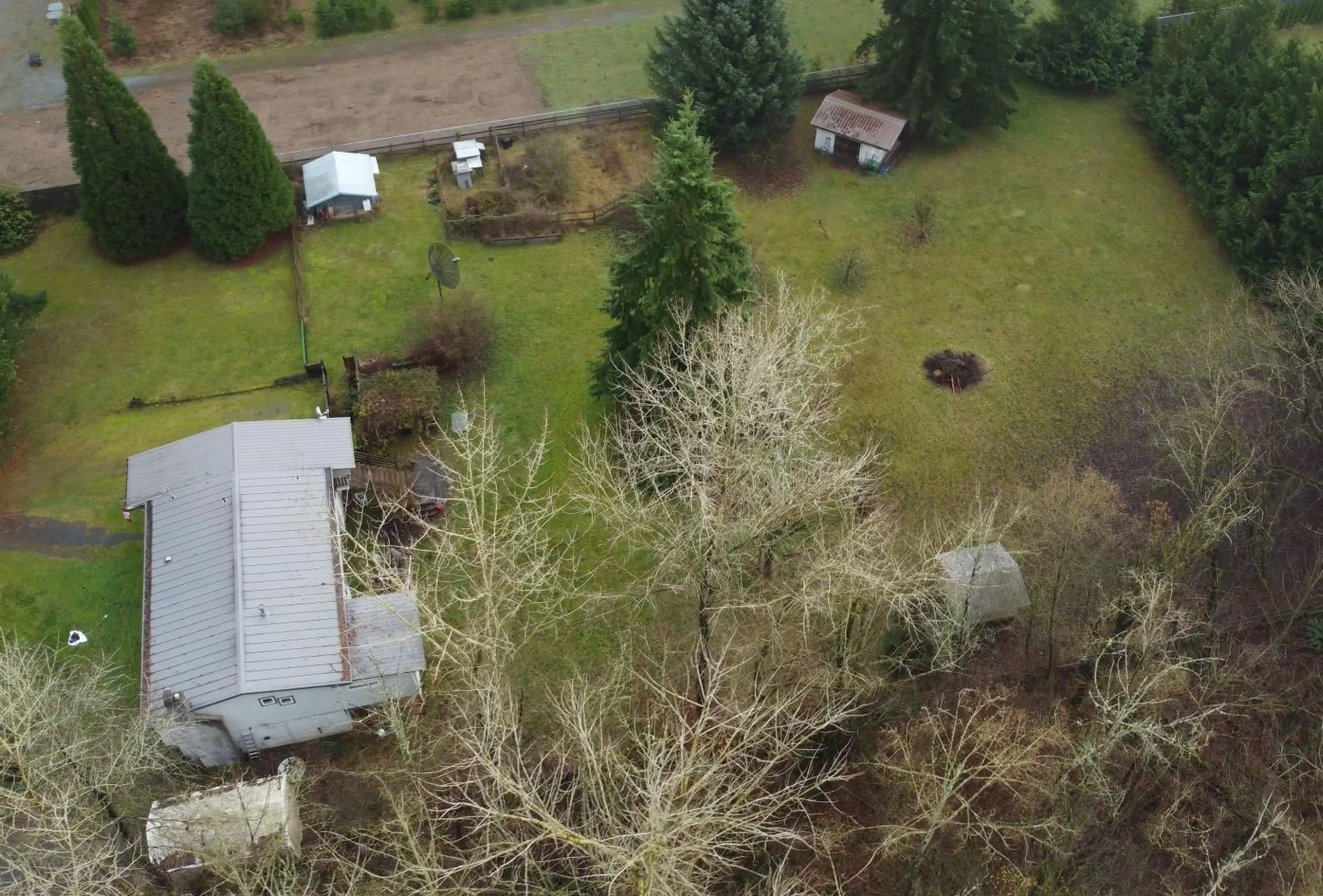 A pic from outside/outdoor area/front of a property/back of a property/a pic from drone, forest/trees view for 24242 52 AVENUE, Langley British Columbia V2Z2N2