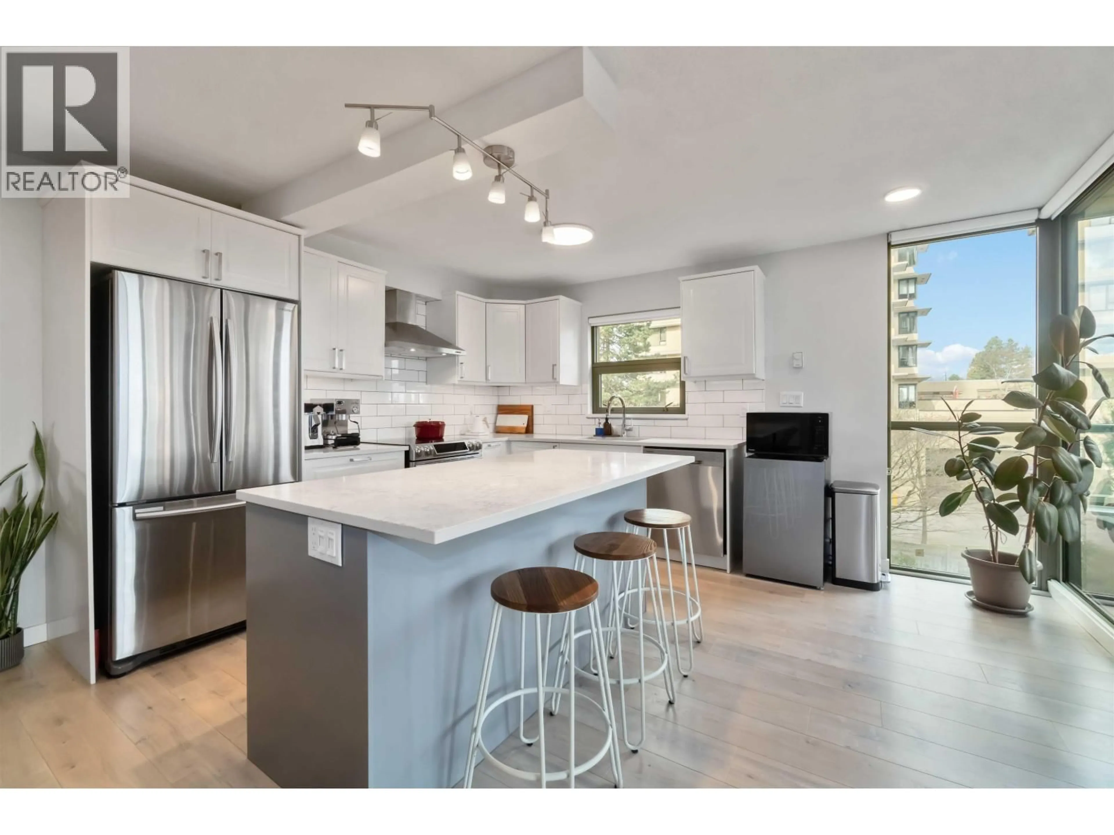 Open concept kitchen, ceramic/tile floor for 440 - 7288 ACORN AVENUE, Burnaby British Columbia V5E4H6