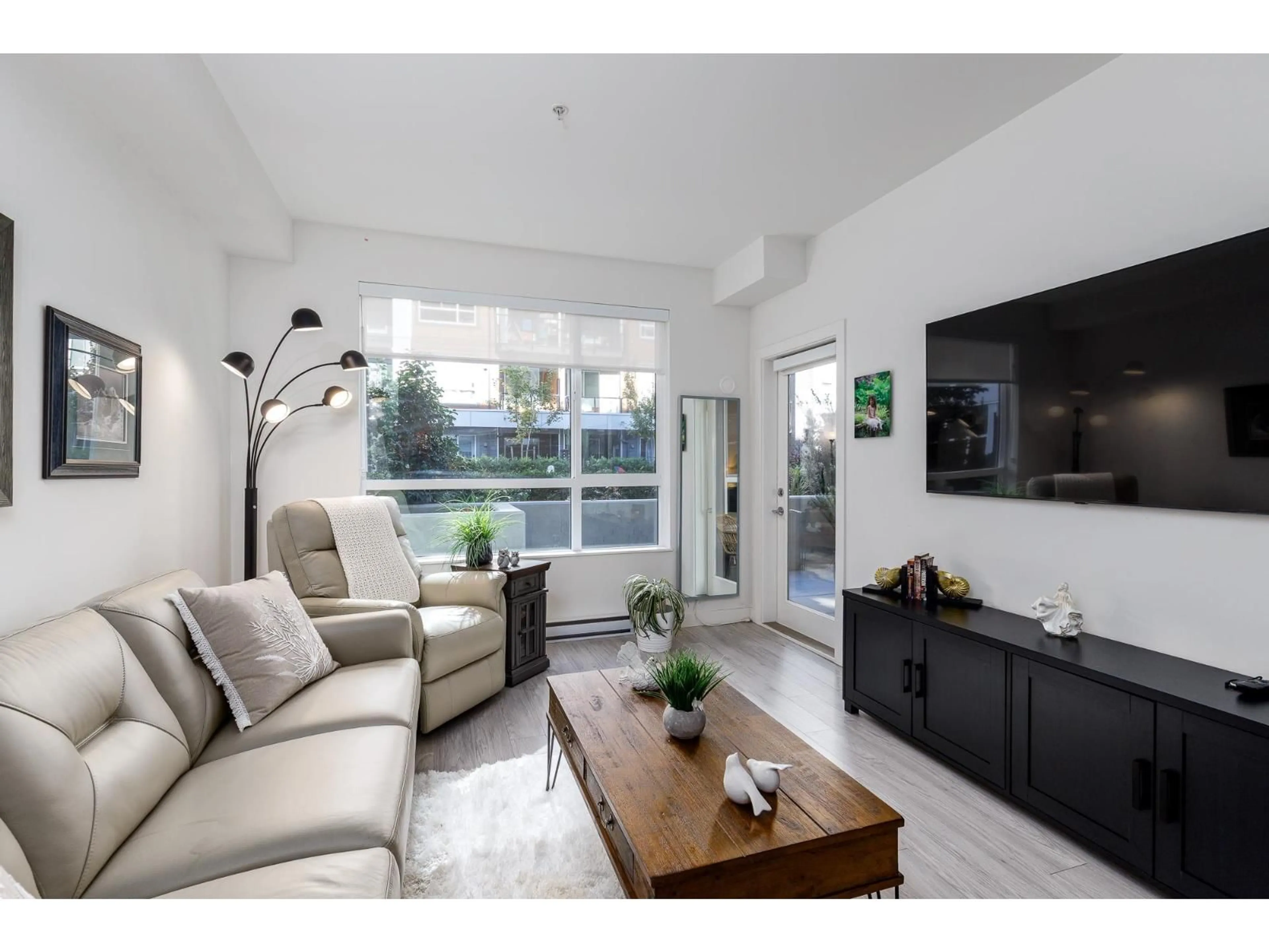 Living room with furniture, unknown for A111 - 20834 80 AVENUE, Langley British Columbia V2Y3M3