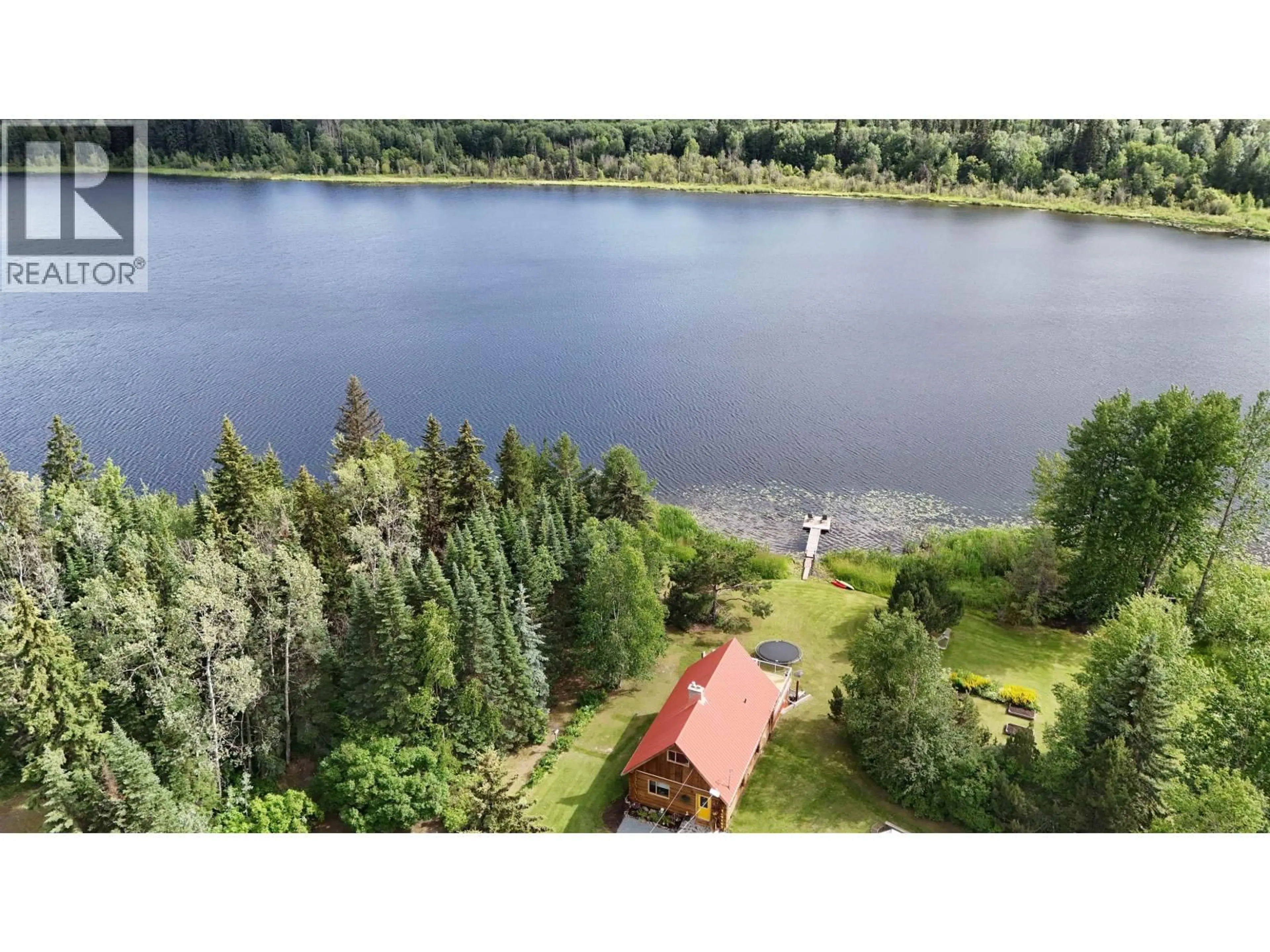 A pic from outside/outdoor area/front of a property/back of a property/a pic from drone, water/lake/river/ocean view for 24845 CHIEF LAKE ROAD, Prince George British Columbia V2K5L1