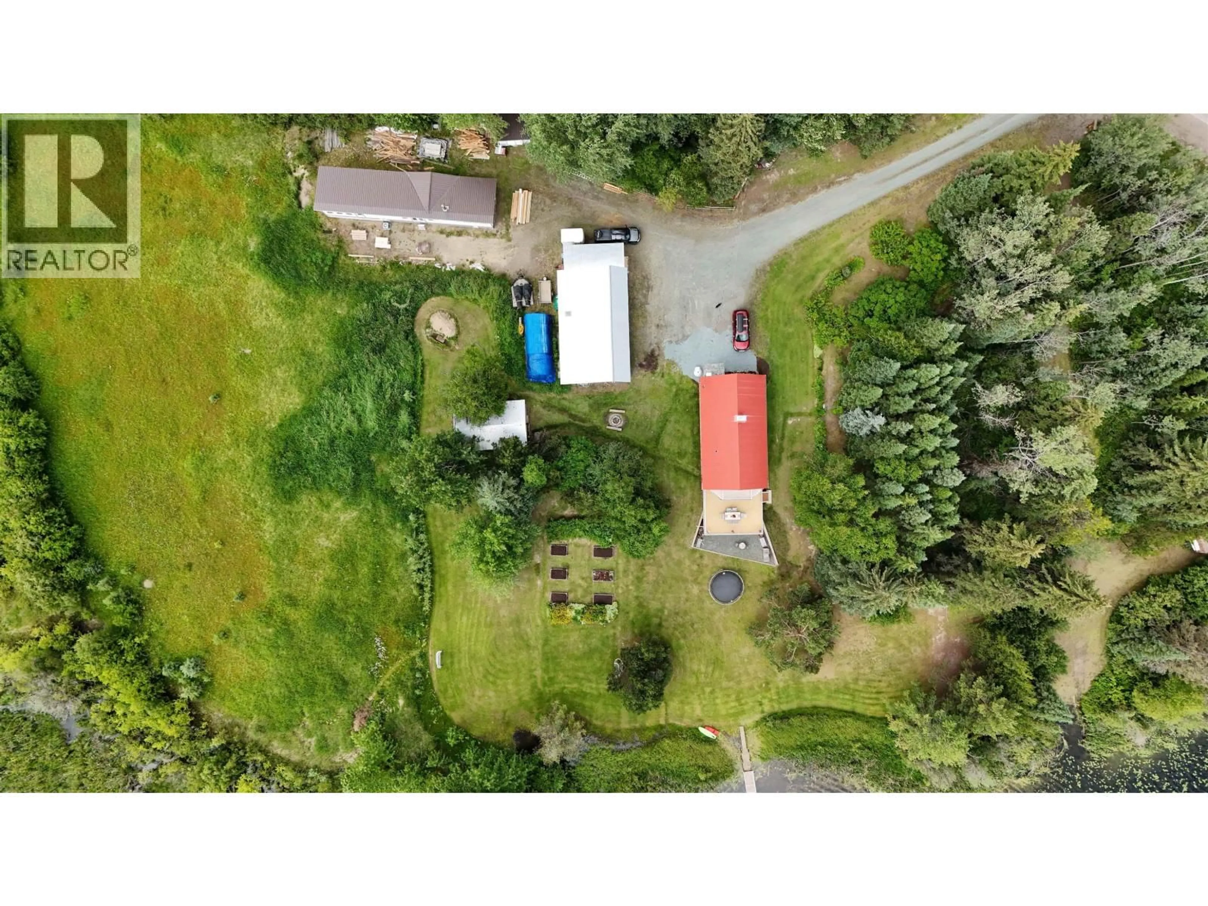 A pic from outside/outdoor area/front of a property/back of a property/a pic from drone, building for 24845 CHIEF LAKE ROAD, Prince George British Columbia V2K5L1