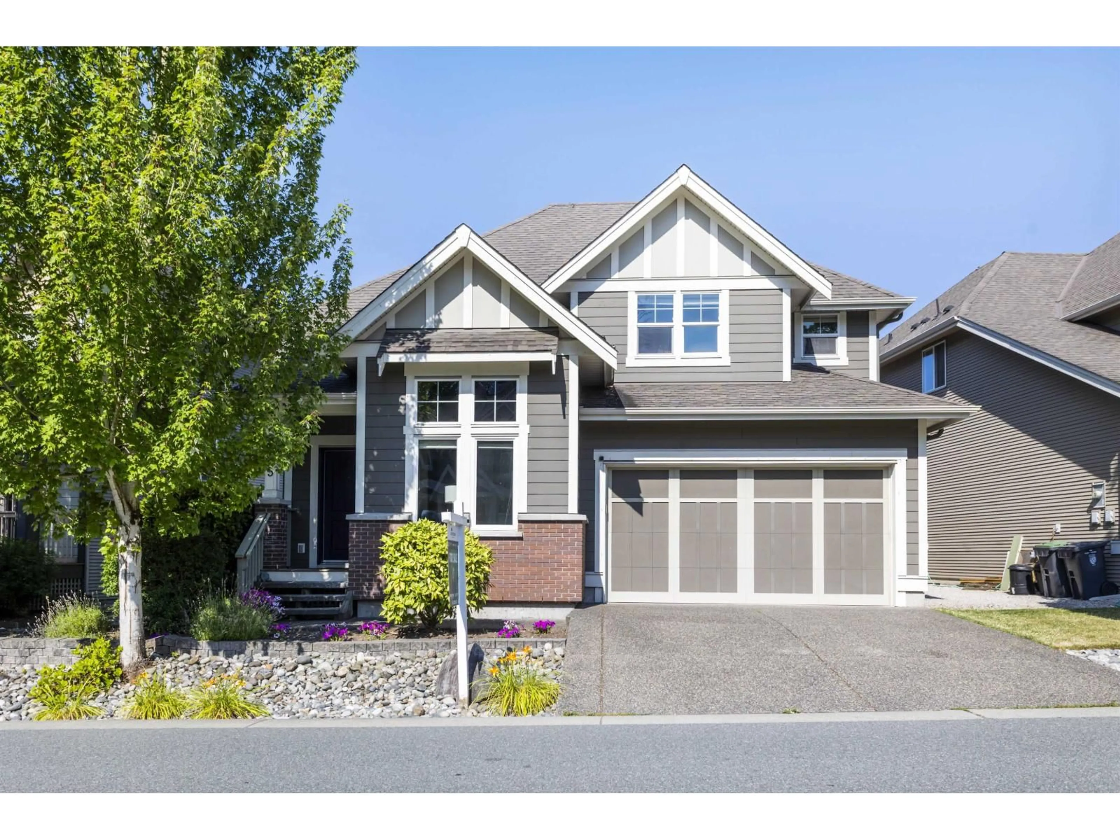 Home with vinyl exterior material, street for 7065 208A STREET, Langley British Columbia V2Y0J2