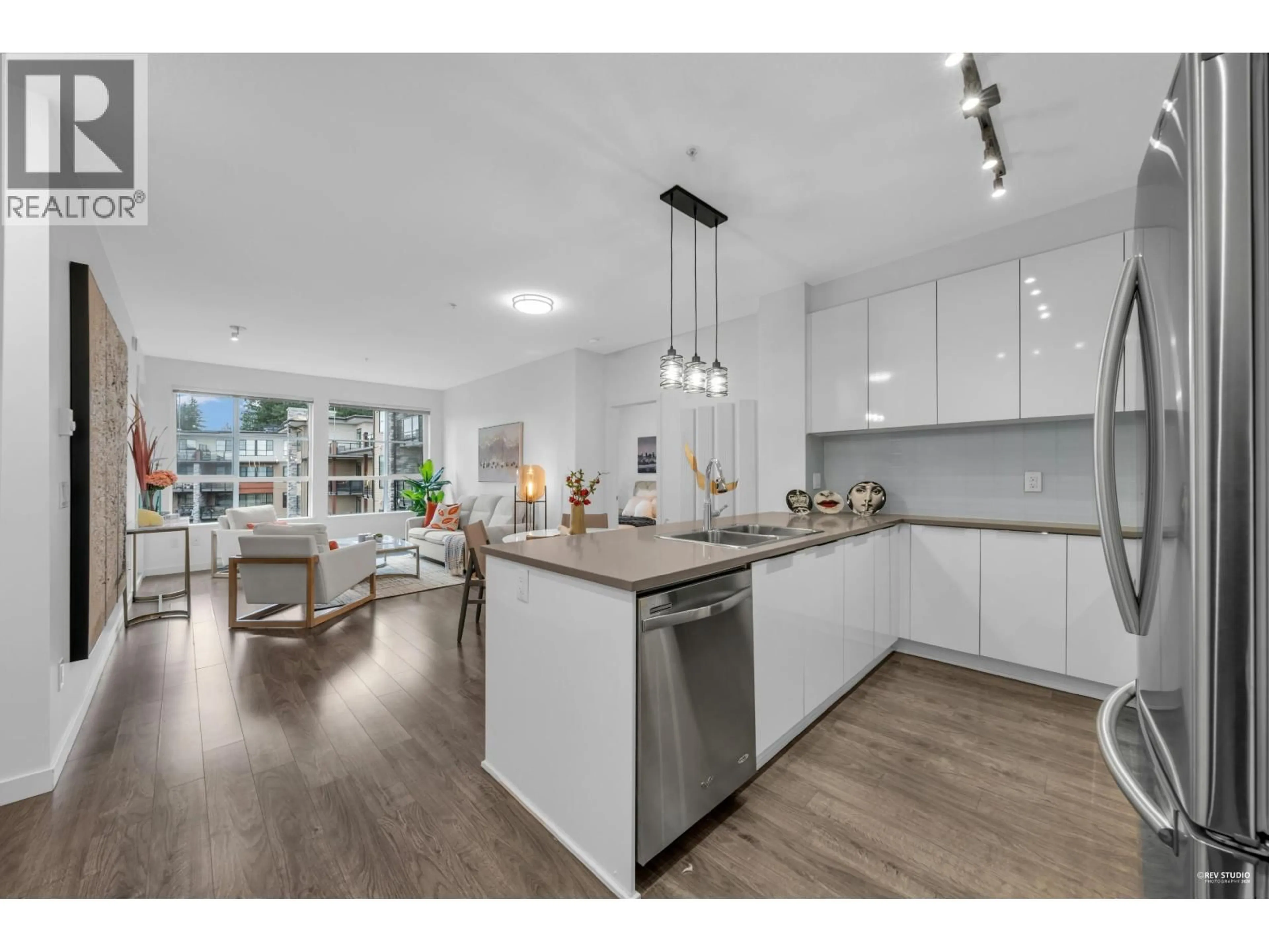 Open concept kitchen, wood/laminate floor for 411 - 1152 WINDSOR MEWS, Coquitlam British Columbia V3B0N1