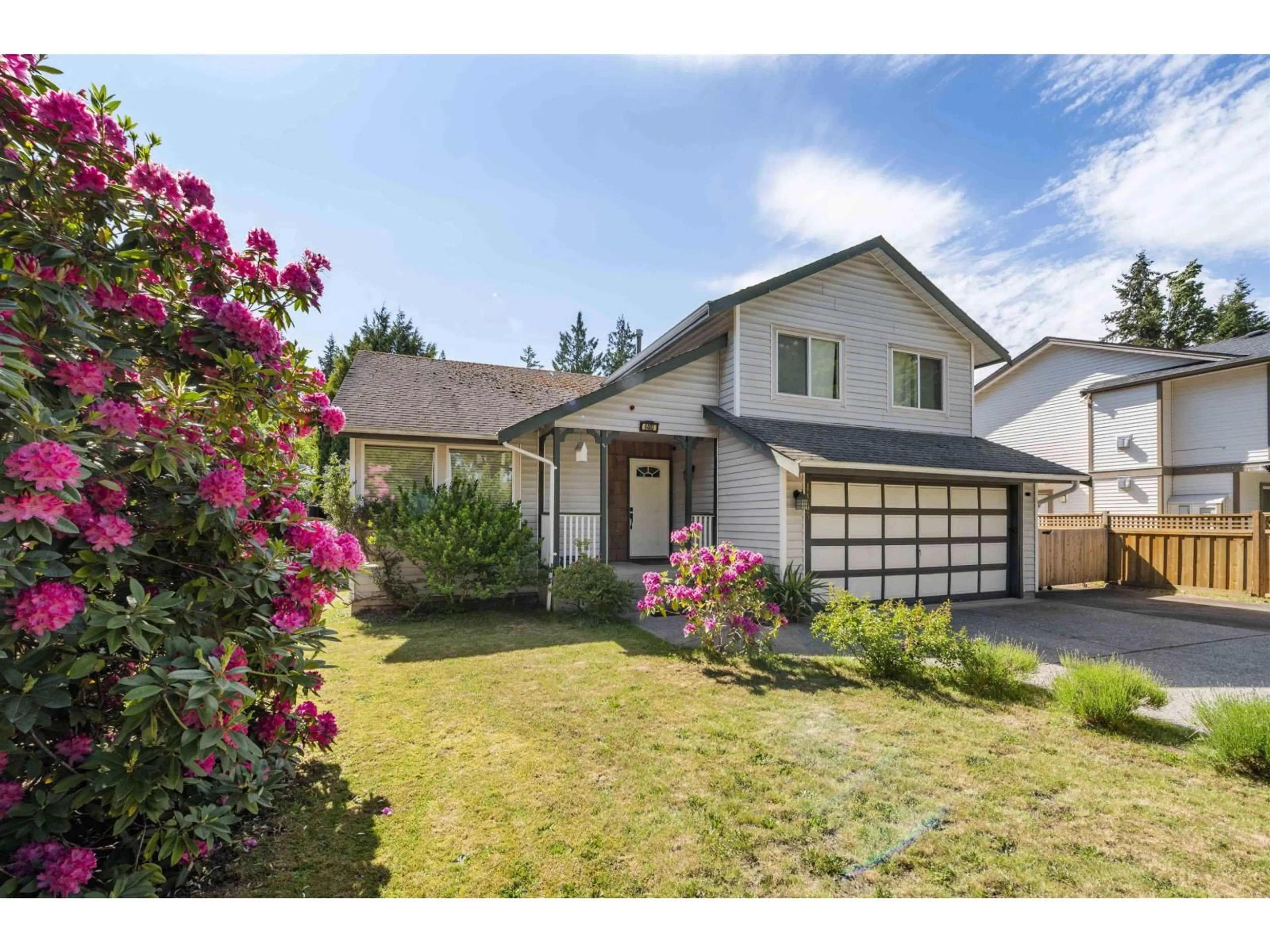 Home with vinyl exterior material, street for 4483 208 STREET, Langley British Columbia V3A2H7