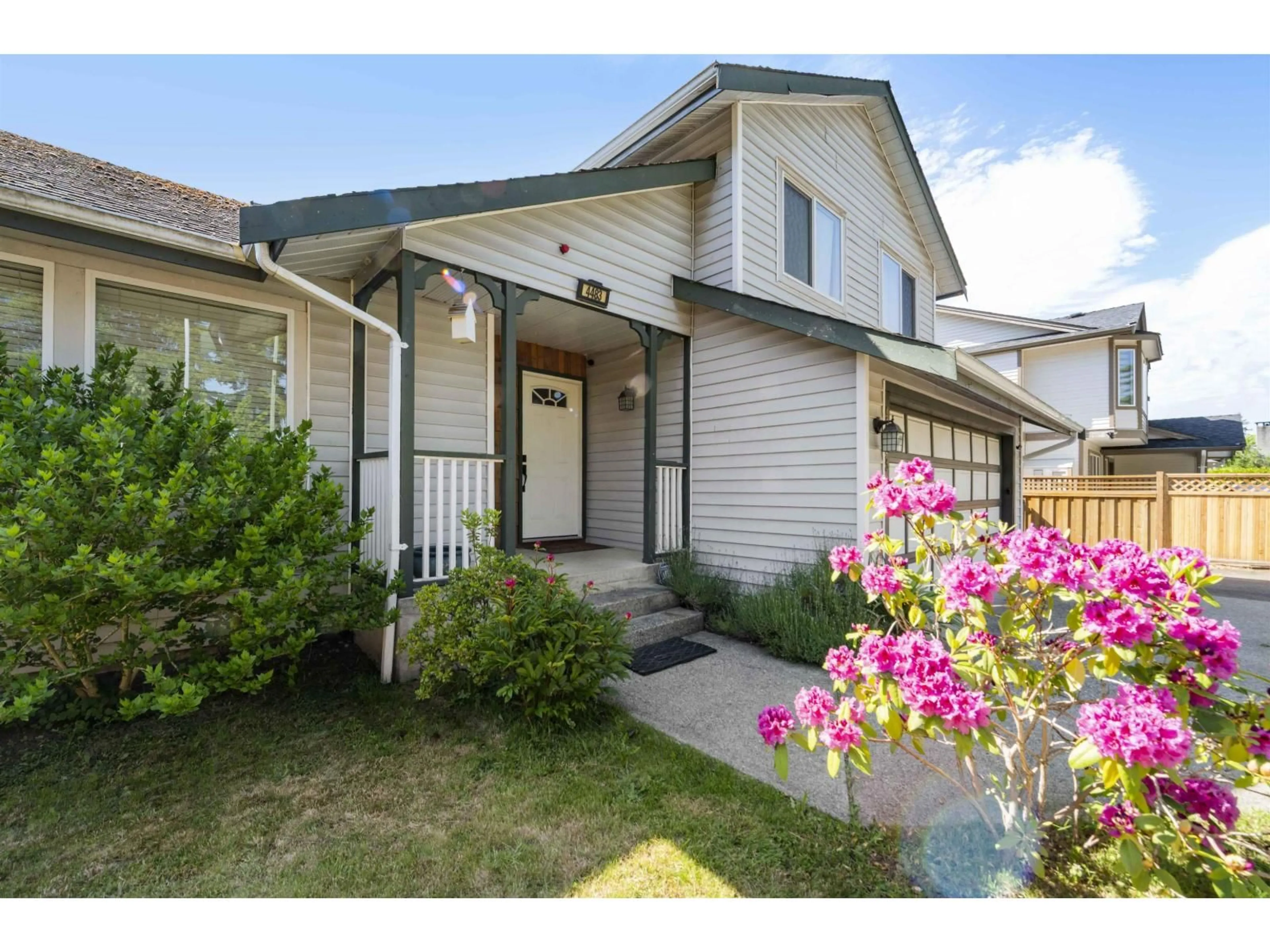 Home with vinyl exterior material, street for 4483 208 STREET, Langley British Columbia V3A2H7