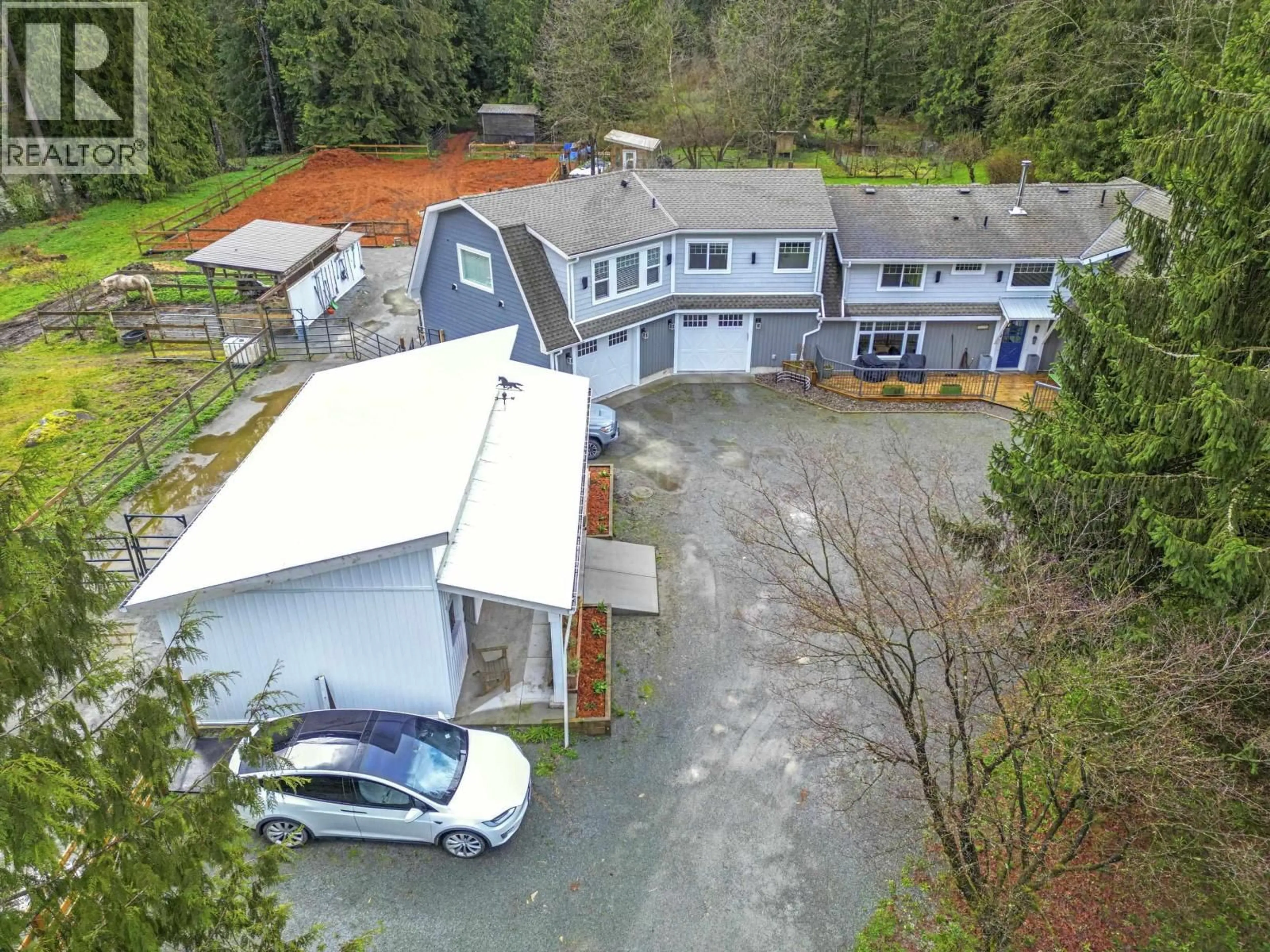 A pic from outside/outdoor area/front of a property/back of a property/a pic from drone, building for 26996 FERGUSON AVENUE, Maple Ridge British Columbia V2W1R9