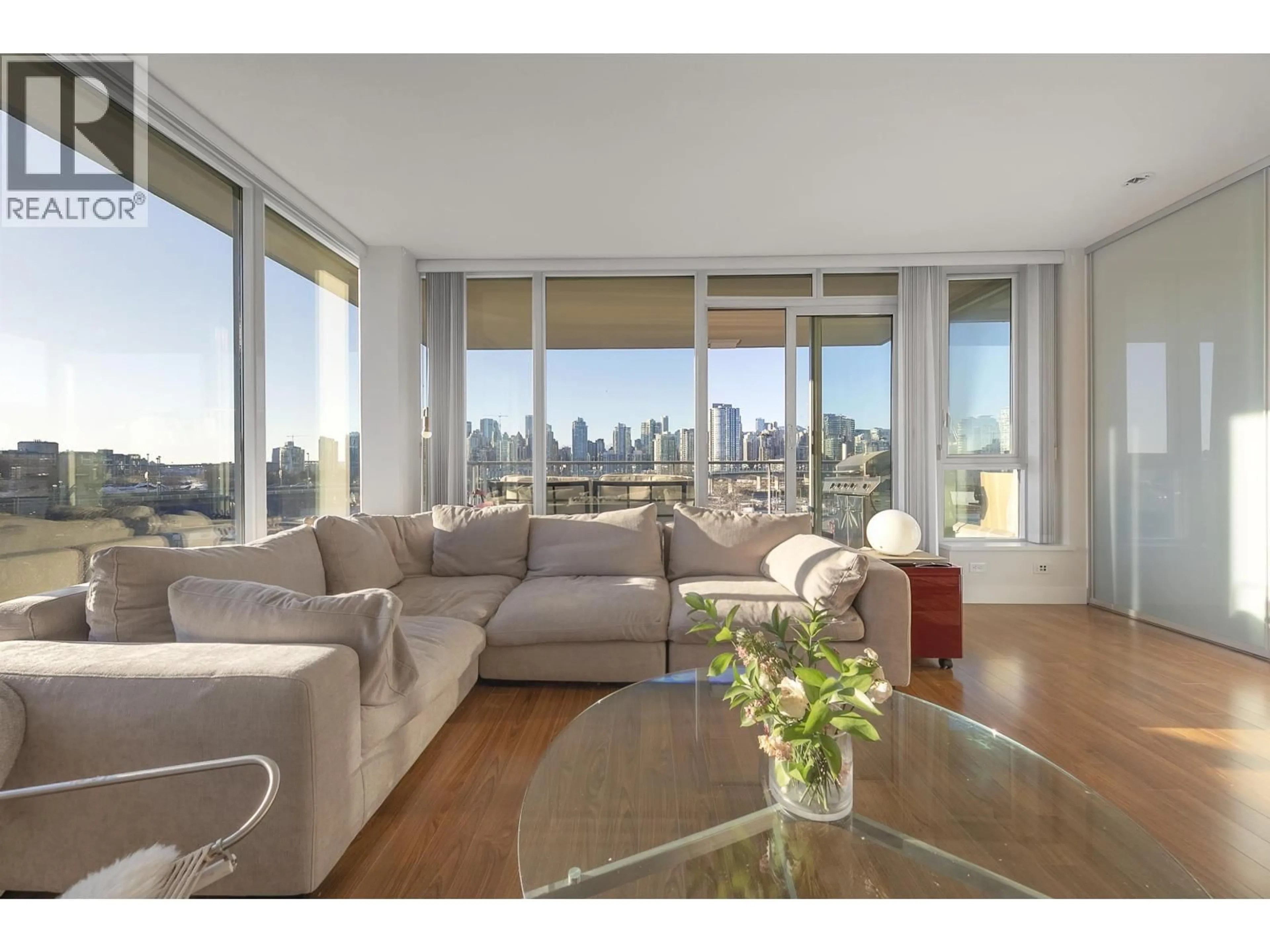 Living room with furniture, wood/laminate floor for 801 - 1833 CROWE STREET, Vancouver British Columbia V5Y0A2