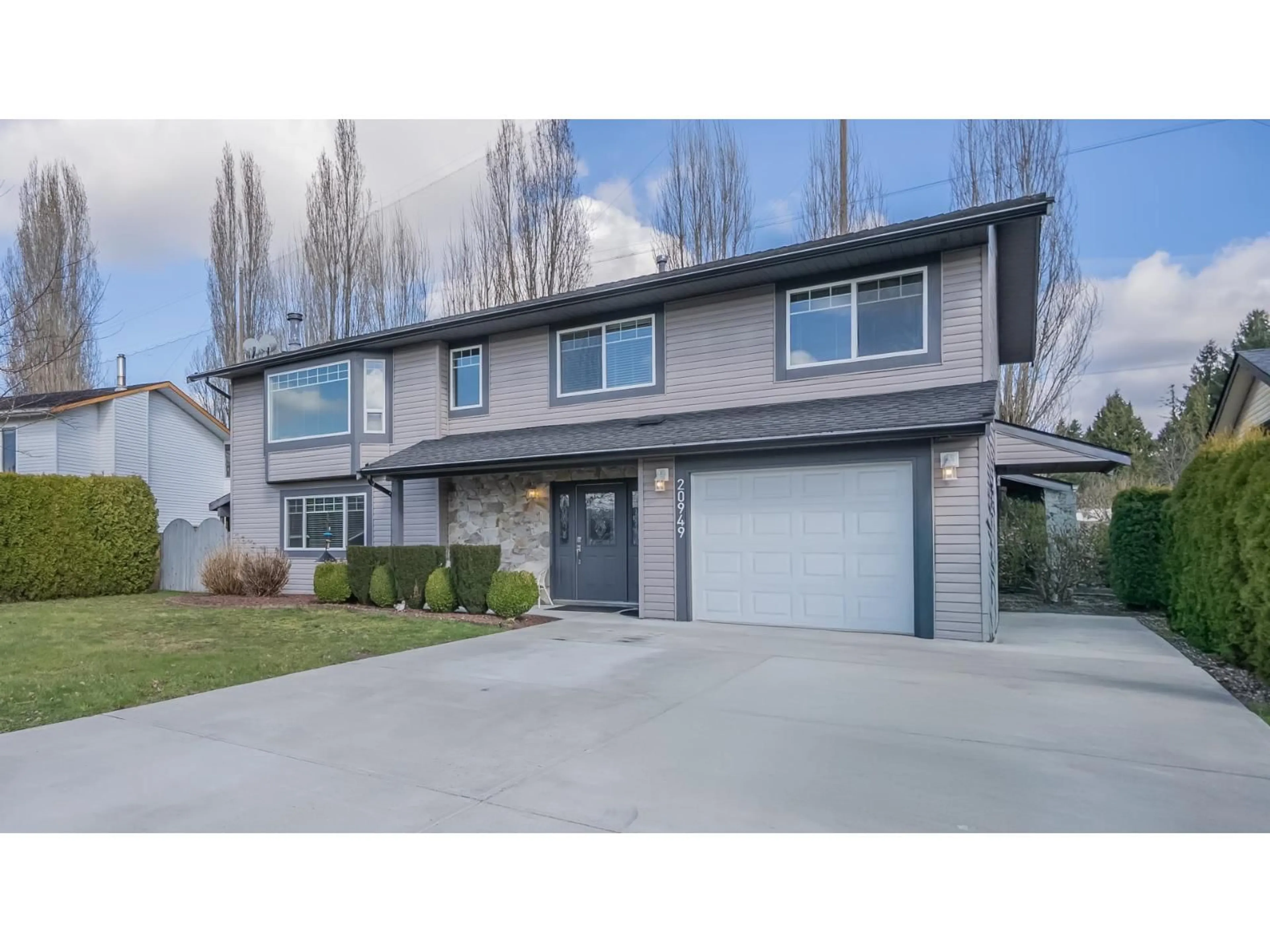 Home with vinyl exterior material, street for 20949 52 AVENUE, Langley British Columbia V3A3T7