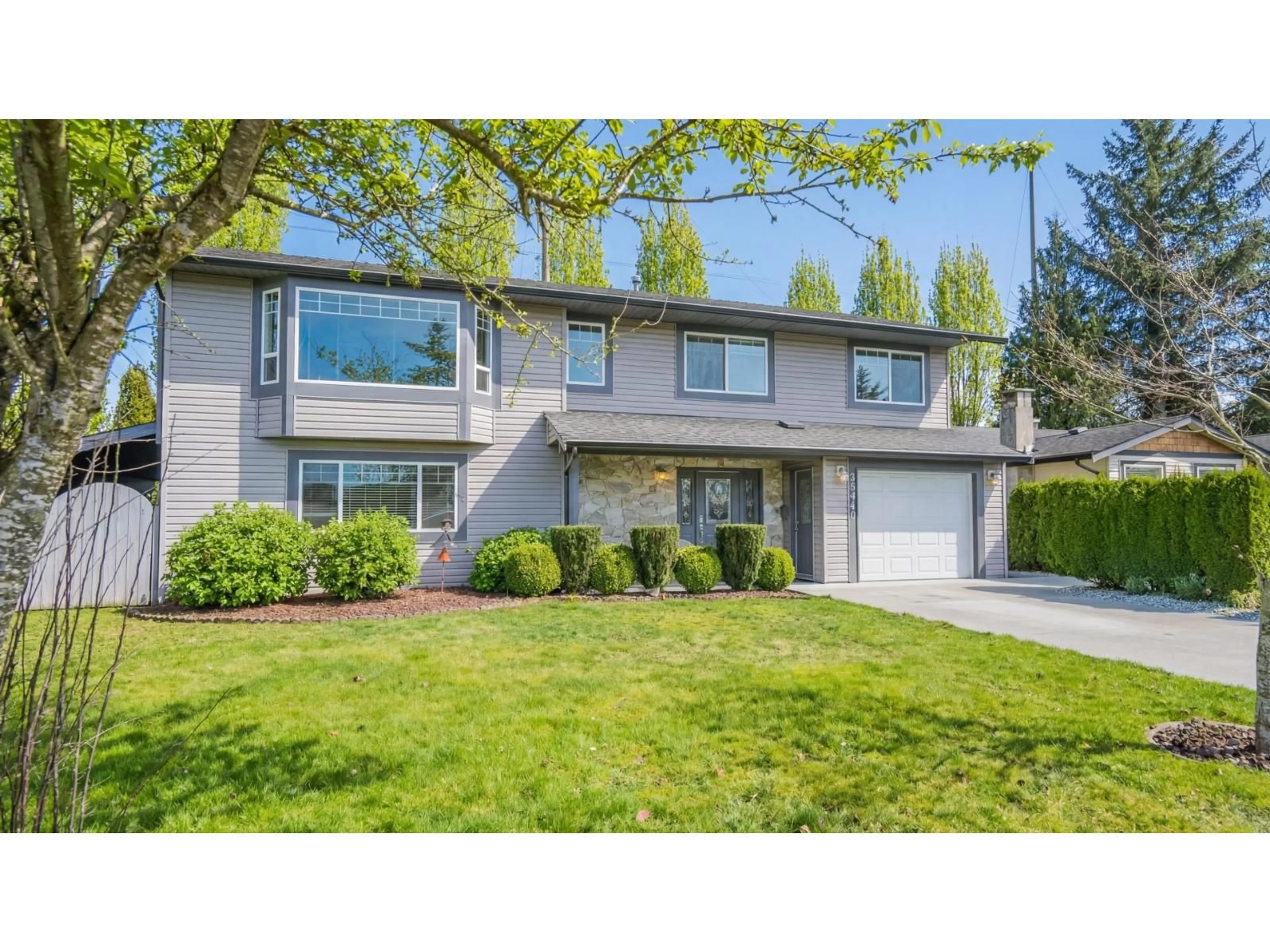 Home with vinyl exterior material, street for 20949 52 AVENUE, Langley British Columbia V3A3T7