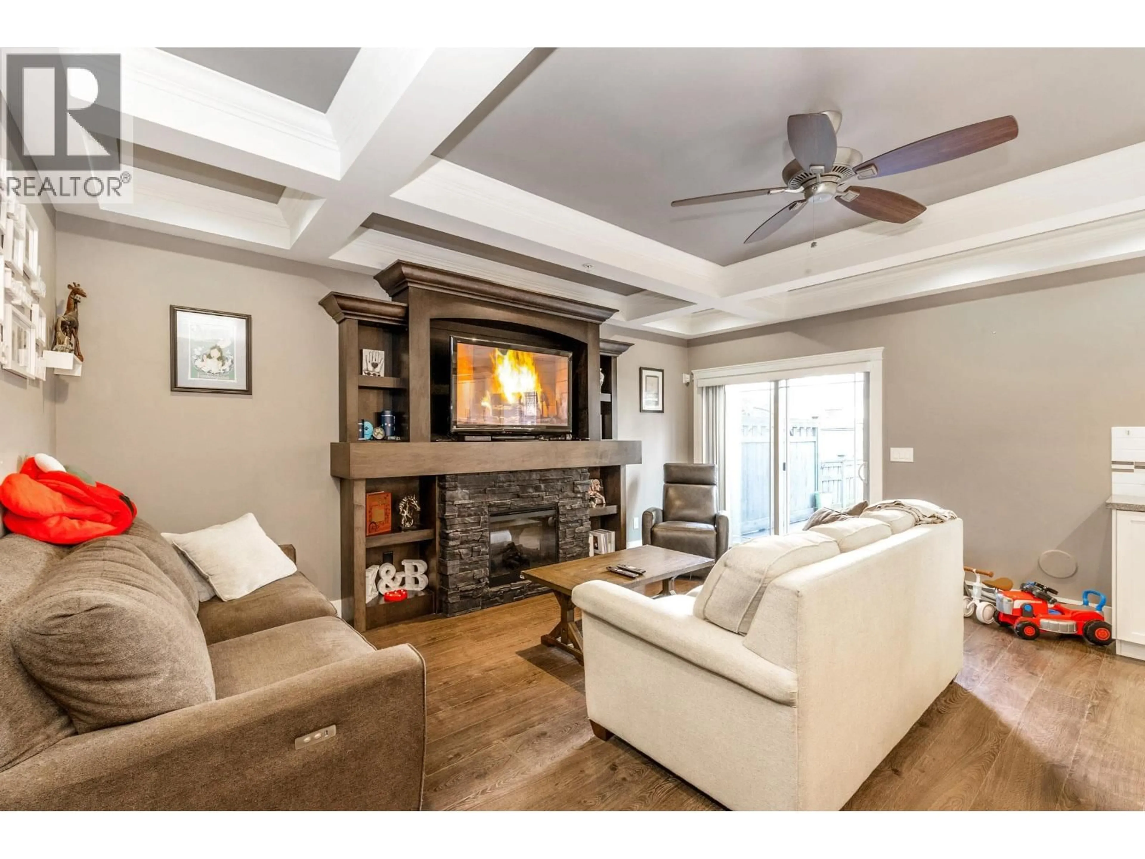 Living room with furniture, wood/laminate floor for 30 - 19095 MITCHELL ROAD, Pitt Meadows British Columbia V3Y0G2