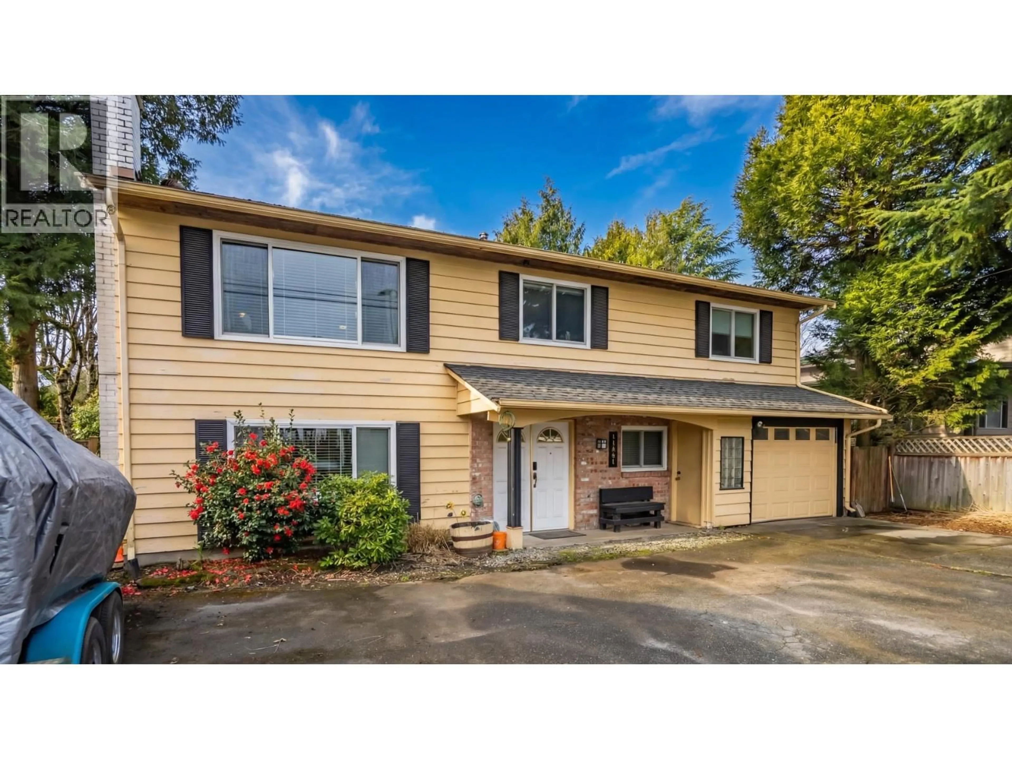 Home with vinyl exterior material, street for 11891 NUMBER 2 ROAD, Richmond British Columbia V7E2E9