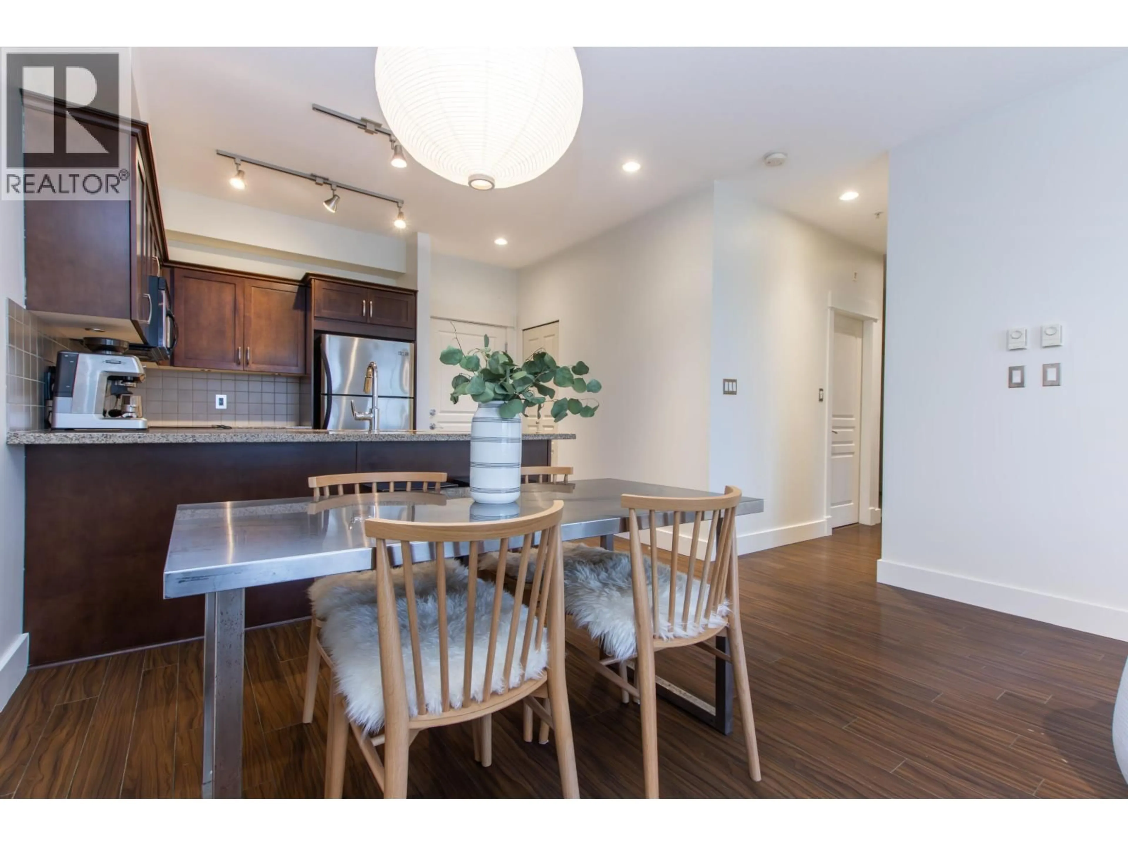 Open concept kitchen, wood/laminate floor for 303 - 1336 MAIN STREET, Squamish British Columbia V8B0R2