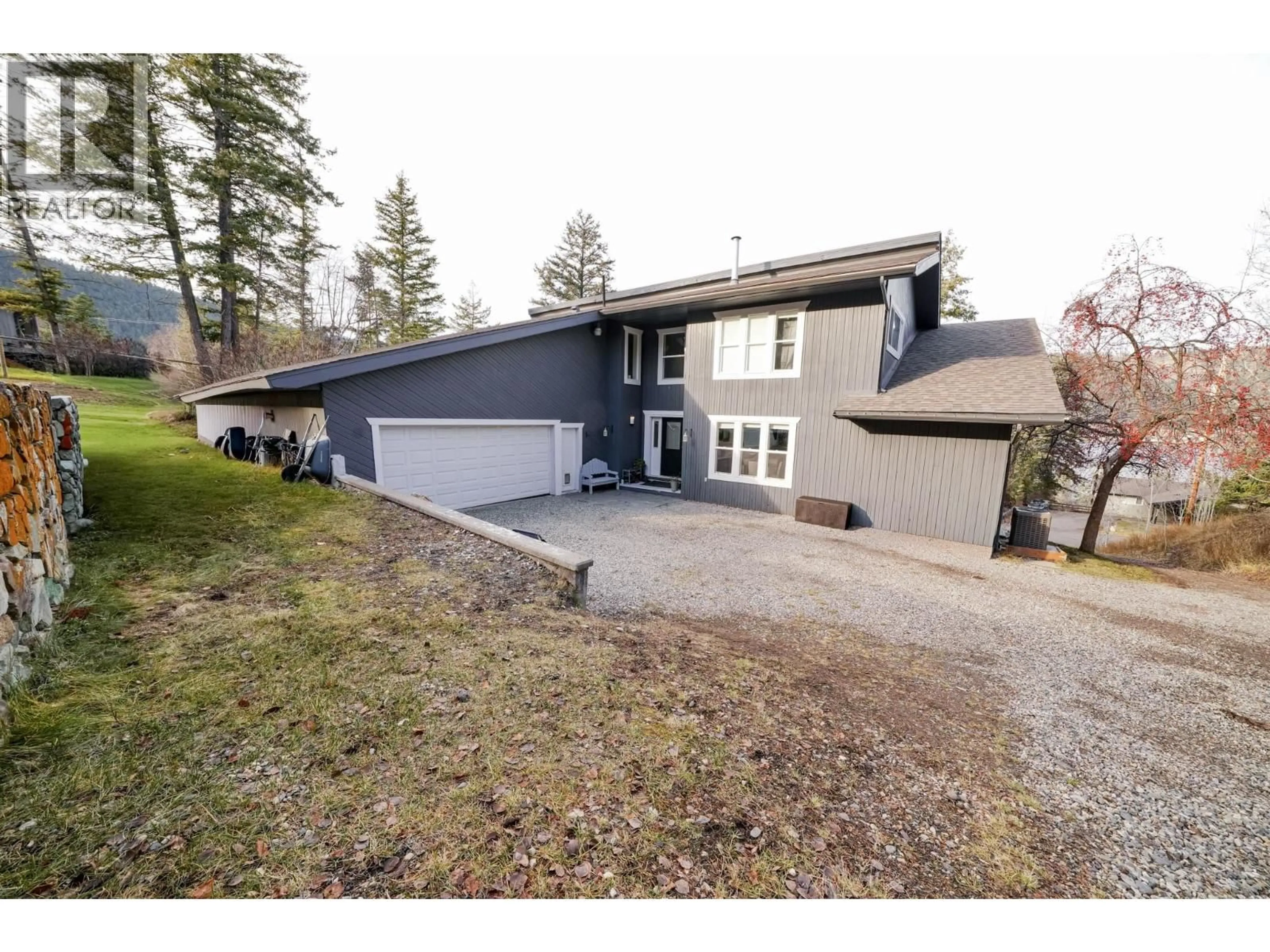 A pic from outside/outdoor area/front of a property/back of a property/a pic from drone, street for 2124 SOUTH LAKESIDE DRIVE, Williams Lake British Columbia V2G5G4