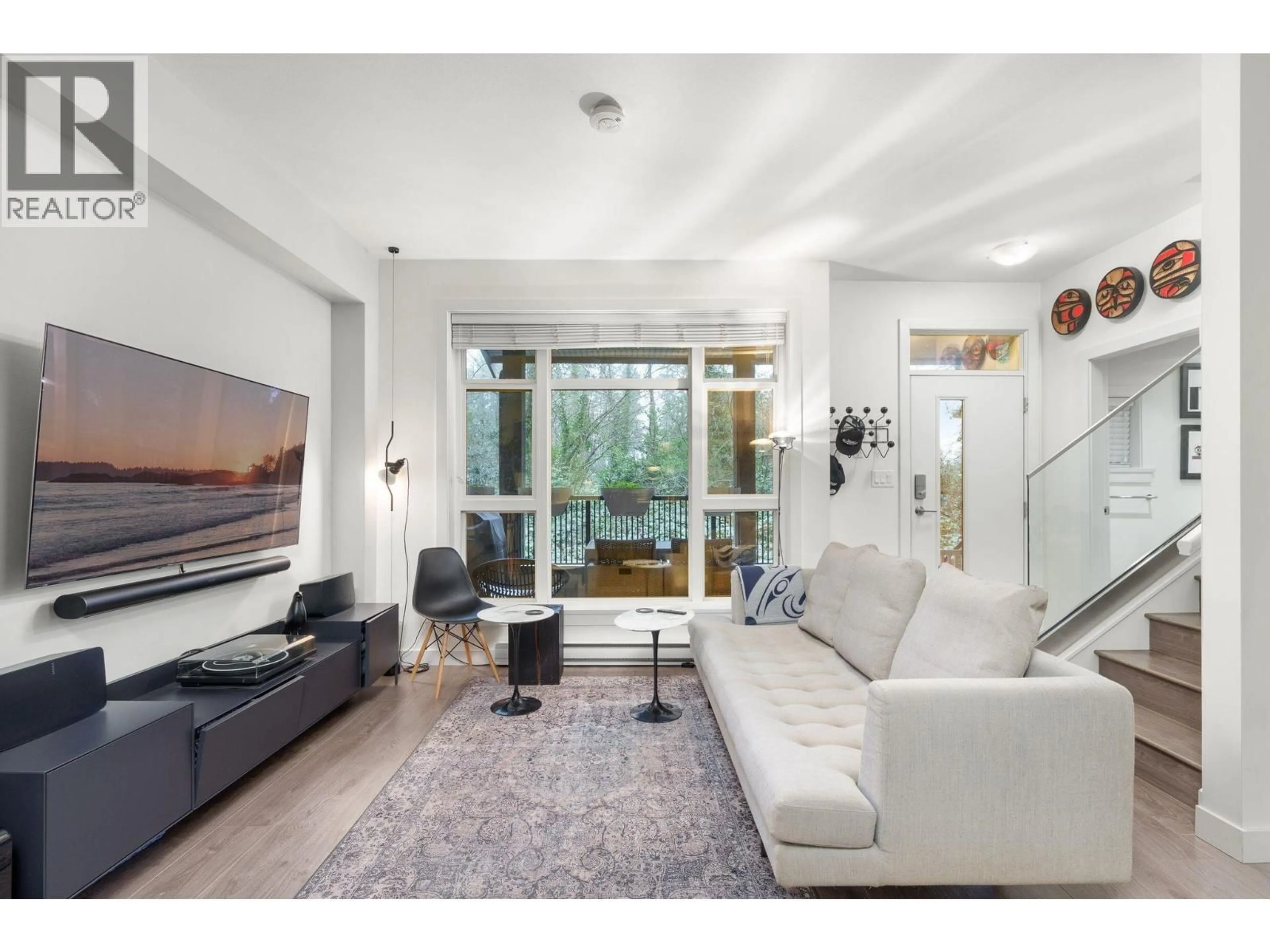 Living room with furniture, unknown for 307 - 2135 HERITAGE PARK LANE, North Vancouver British Columbia V7H0B6