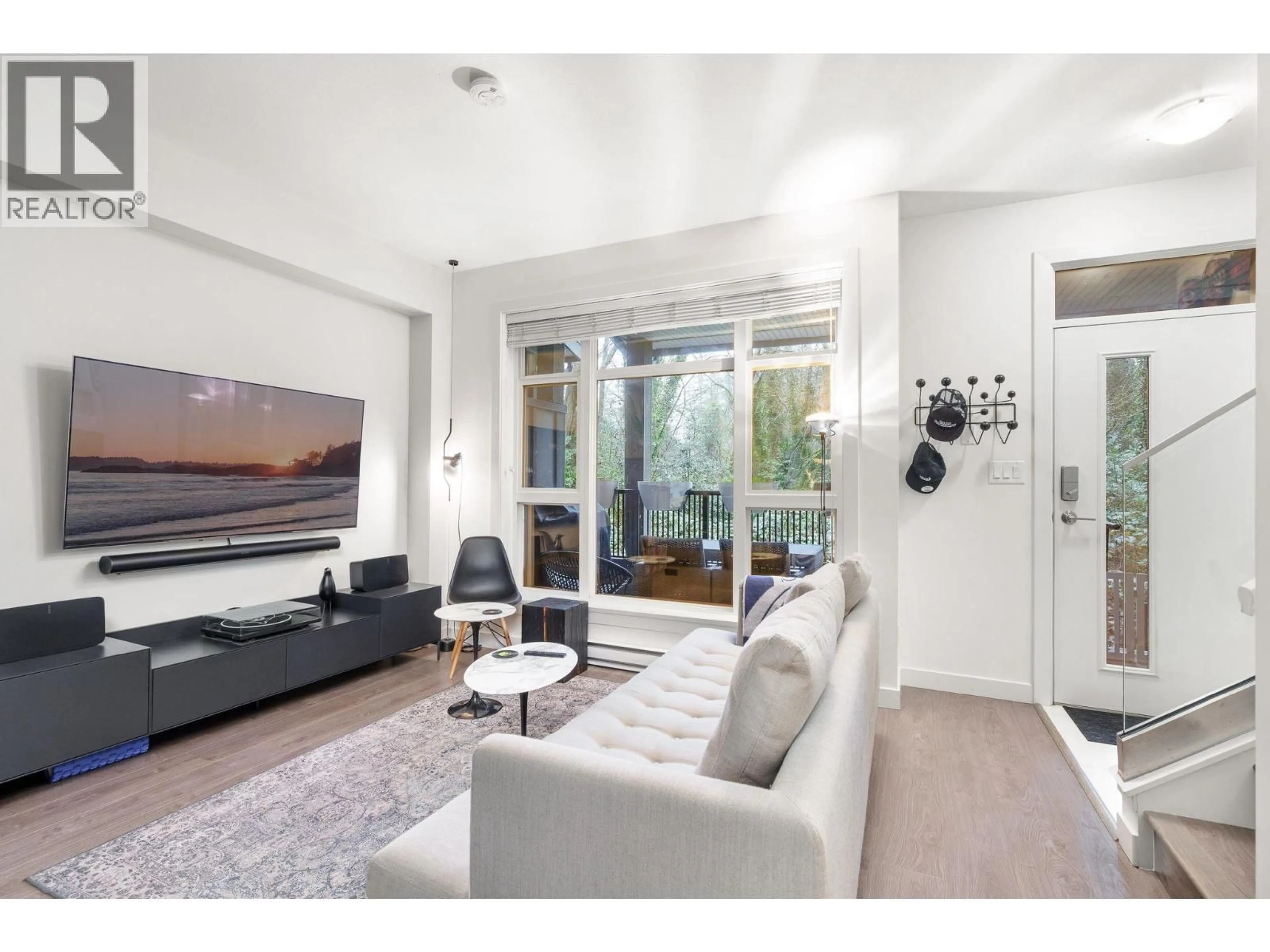 Living room with furniture, unknown for 307 - 2135 HERITAGE PARK LANE, North Vancouver British Columbia V7H0B6